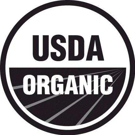 USDA Organic logo with black and white design and stylized field or crop lines.