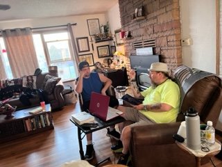 Jesse is being mentored by JB on how to wisely invest his hard-earned pay, ensuring he builds a secure and prosperous future with confidence and enthusiasm!