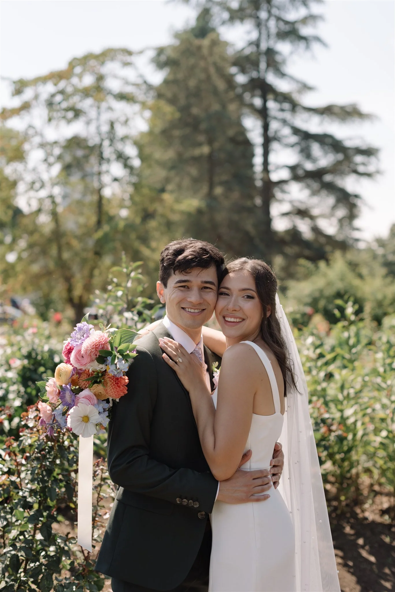 Wedding couple portrait at Queen Elizabeth Park in Vancouver