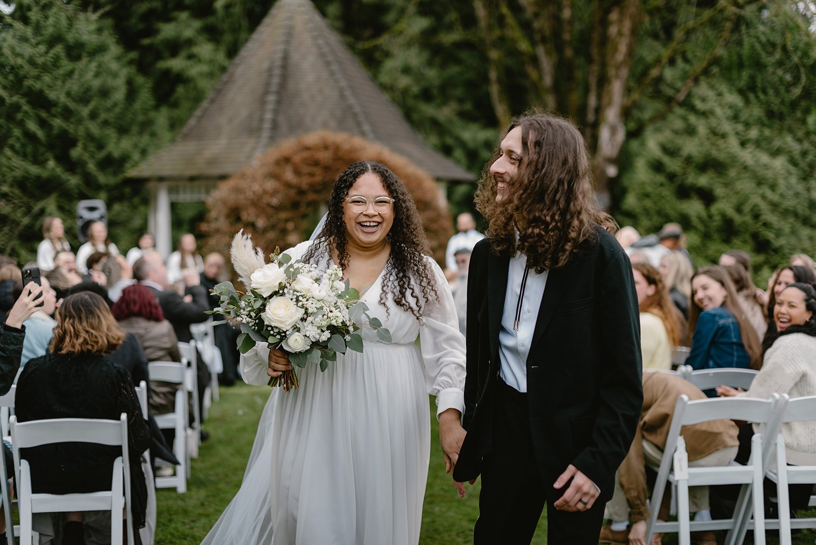 Candid ceremony moment in Abbotsford captured by Vancouver wedding photographer Valerie Gabrielle