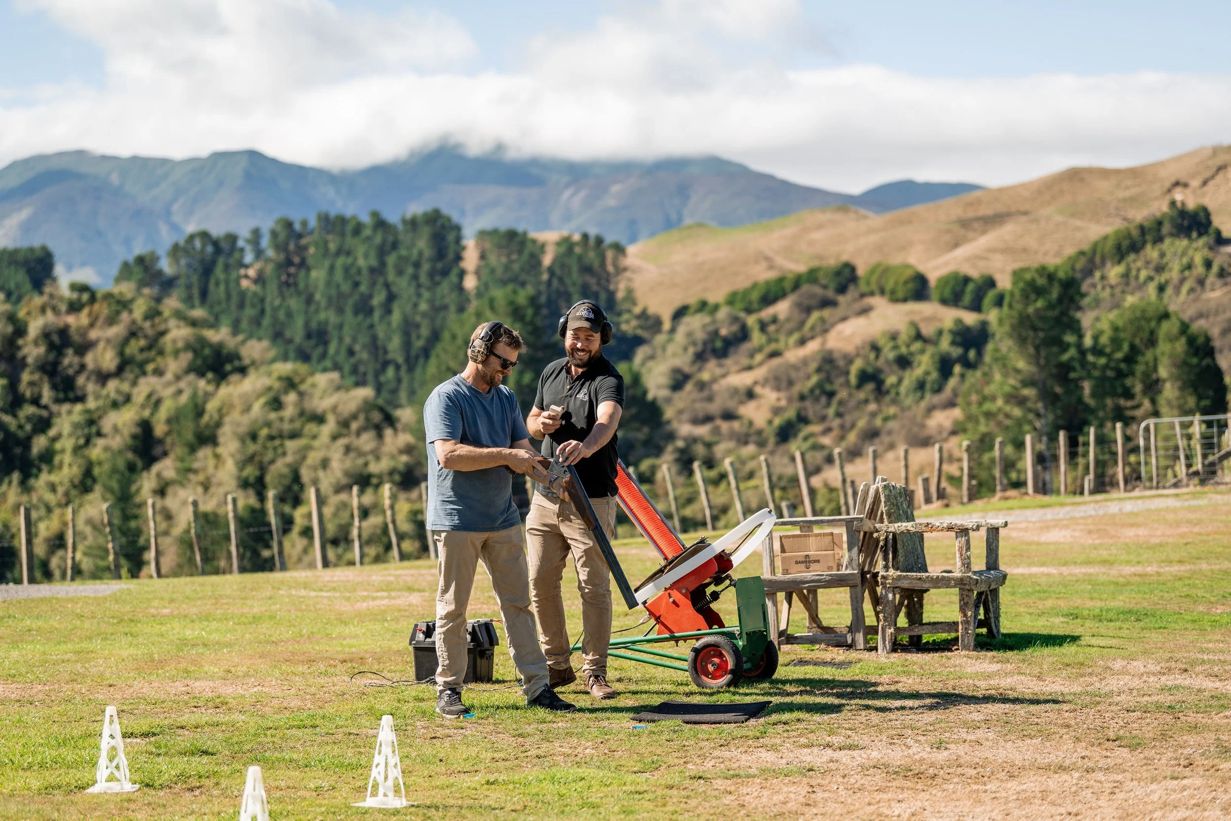 guide showing guest how to clay target shoot at Makoura Lodge