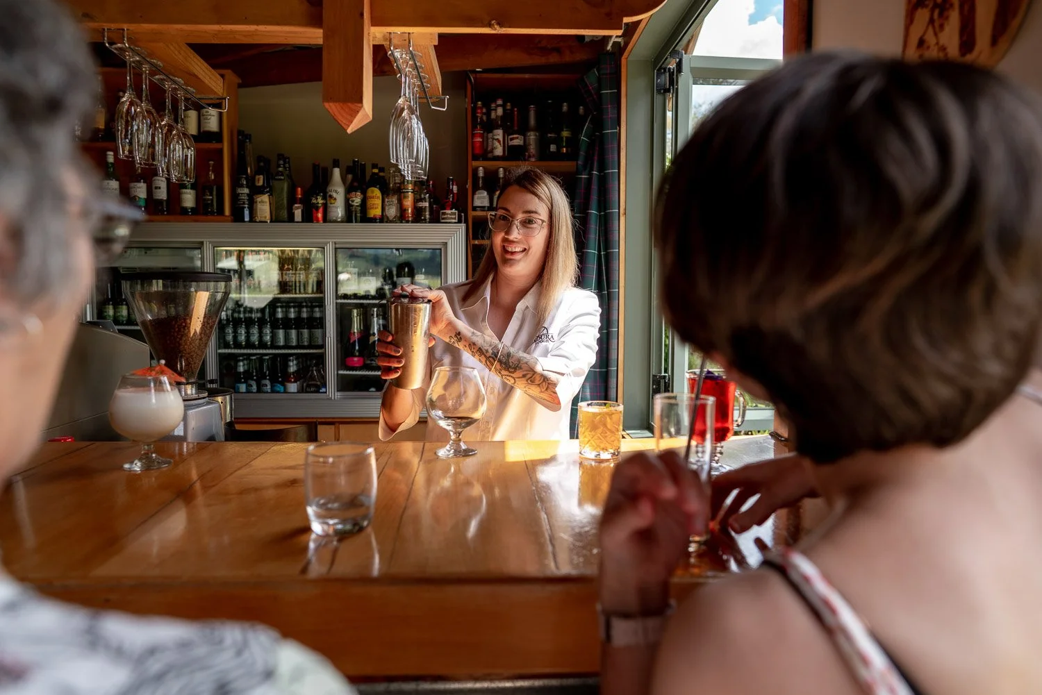 Ladies enjoying a cocktail making class at Makoura lodge