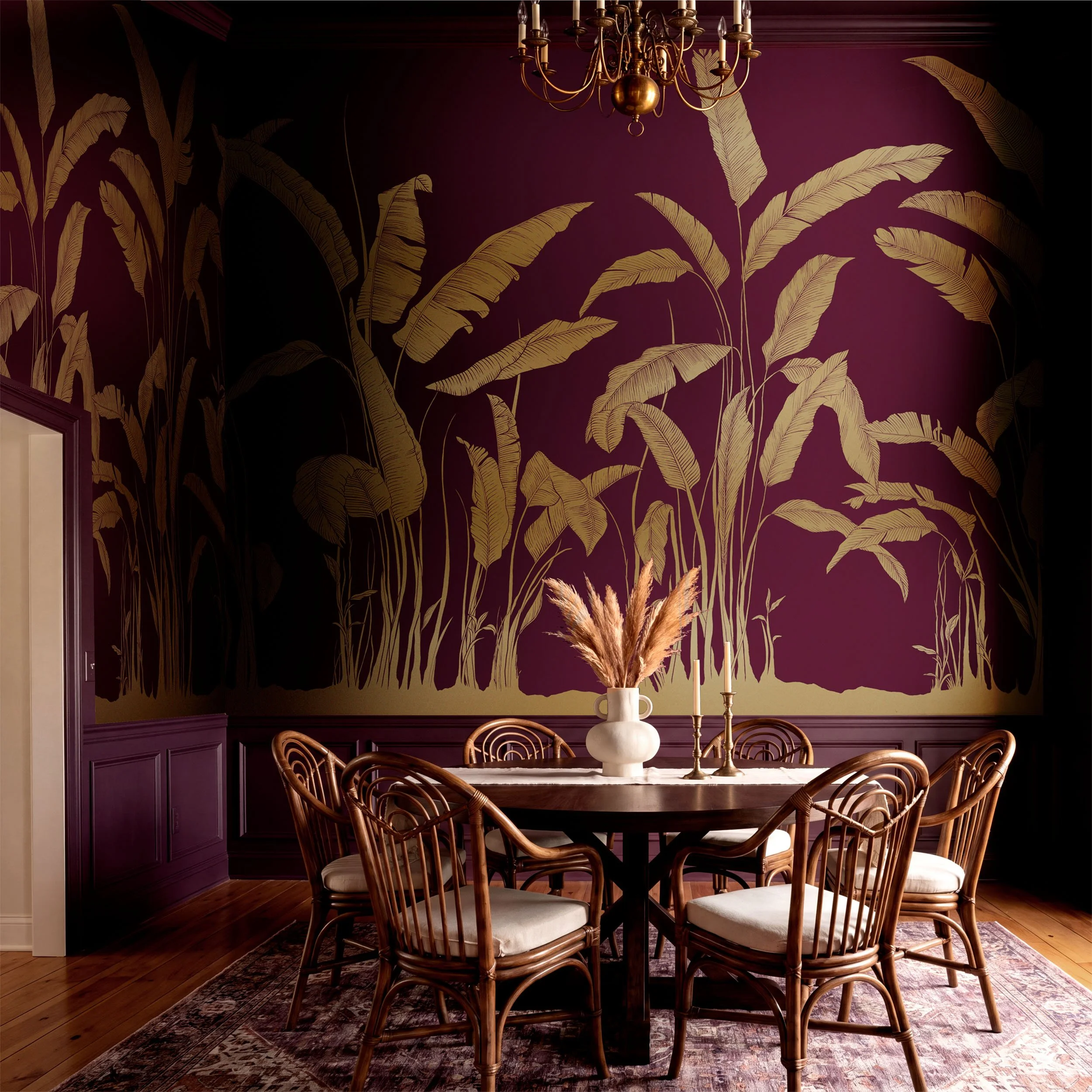 Gilded Silhouette Aubergine luxury dining room wallpaper mural featuring metallic gold tropical palms in a dramatic plum interior.