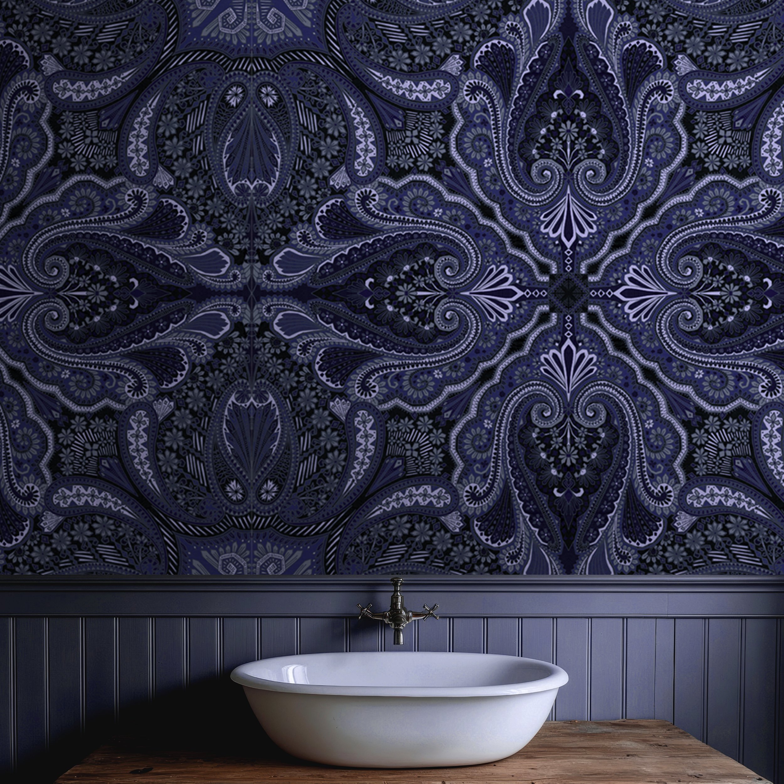 Luxury Prussian blue paisley wallpaper in a moody bathroom with intricate indigo detailing and dark blue wall paneling