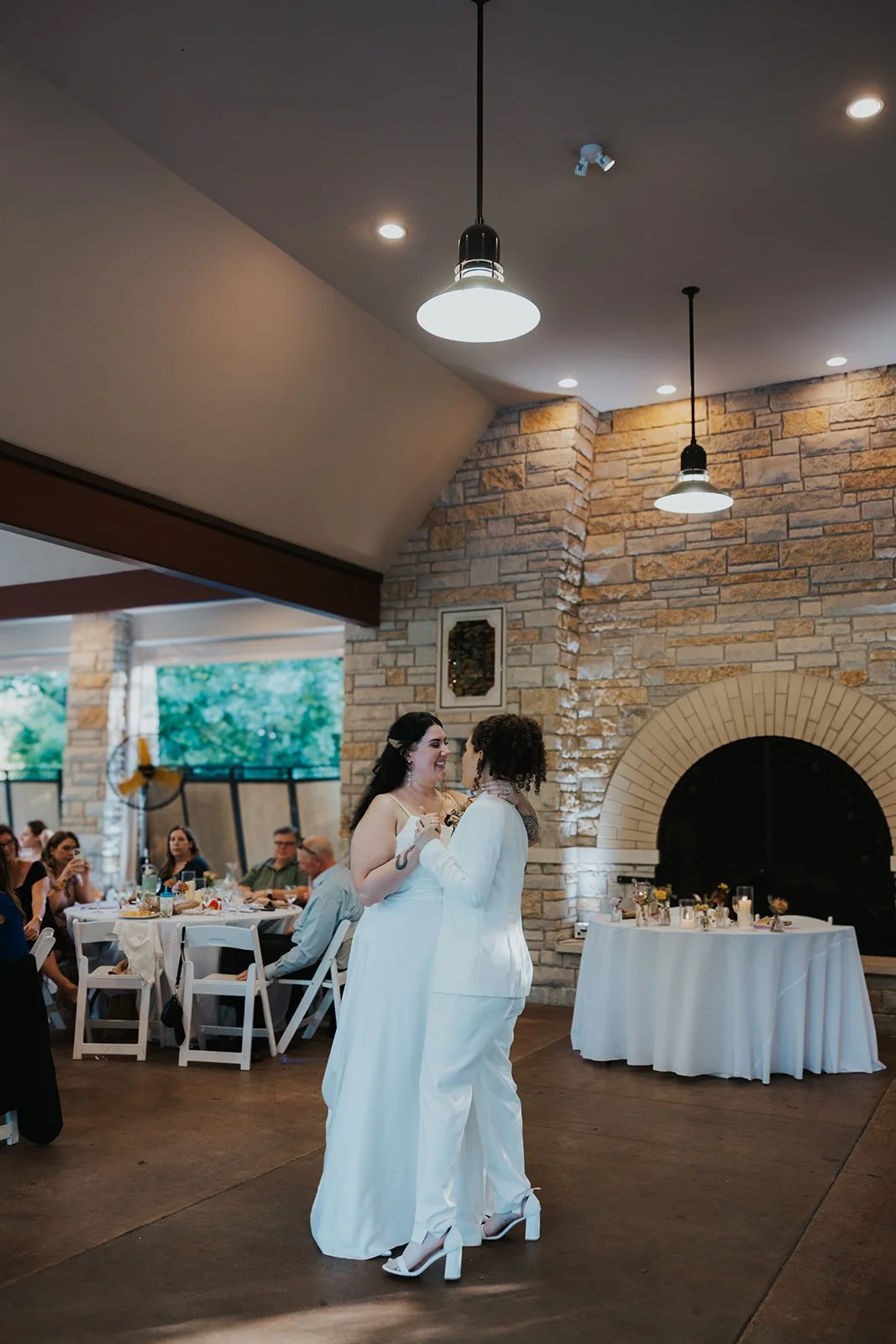 First dance at wedding reception under pavilion