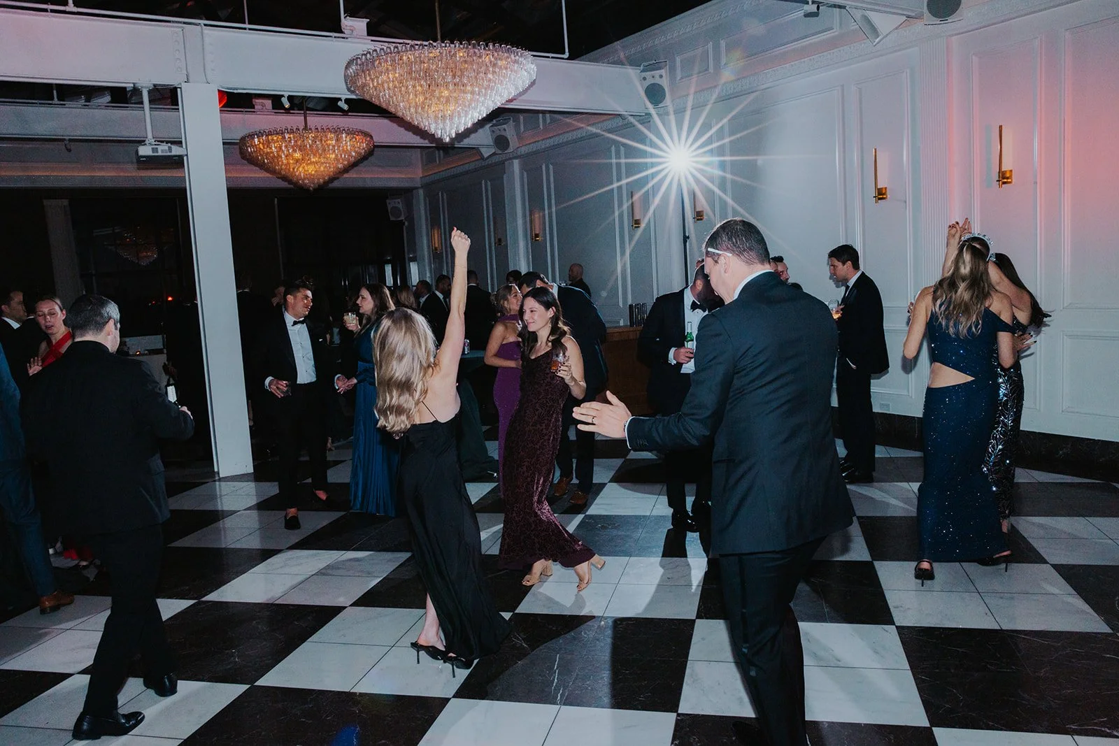 wedding guests on dance floor flash photography