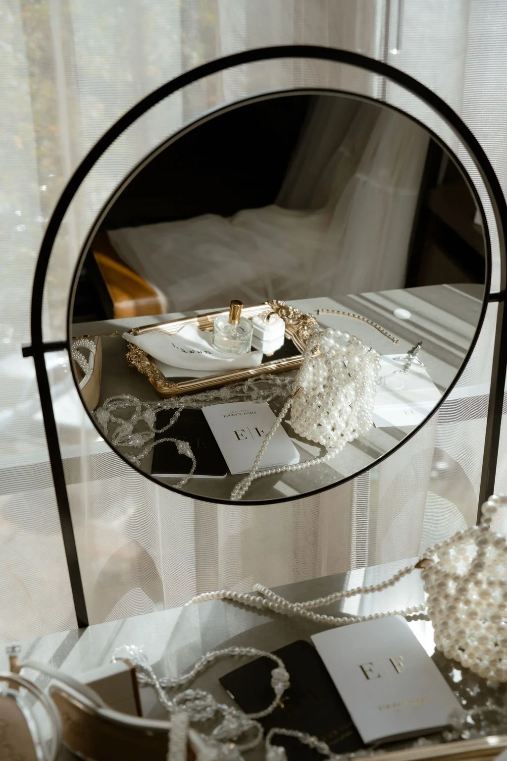 Chicago wedding details set in flatlay reflection of mirror
