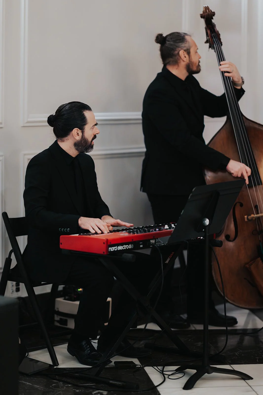 pianist and bassist playing at cocktail hour wedding in Chicago