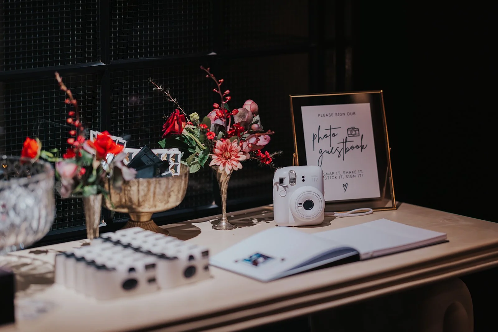 Wedding welcome table with Polaroid guest book
