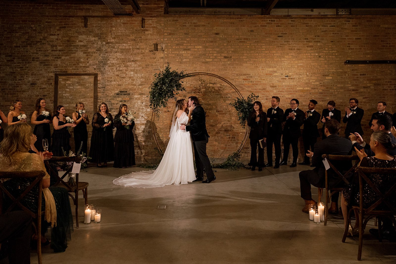 Bride and groom kissing at wedding ceremony at Wildman BT in Chicago