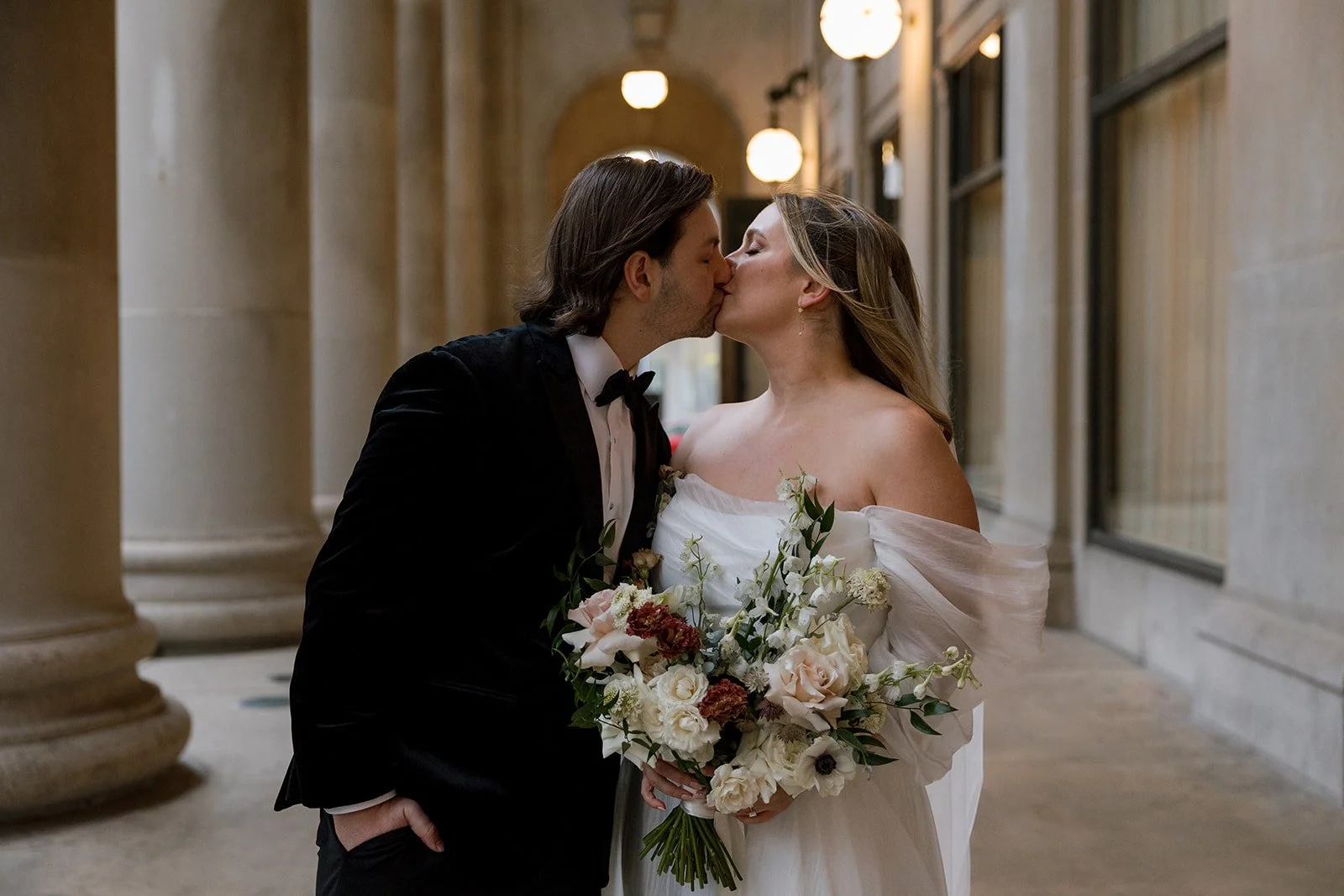 Bride and groom close up kissing at Union Station before wedding at Wildman BT in Chicago
