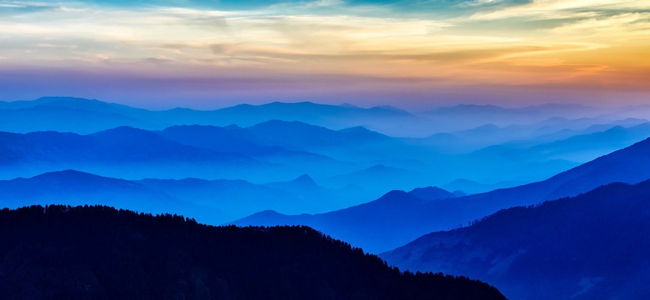 Blue mountains symbolizing spiritual mentoring