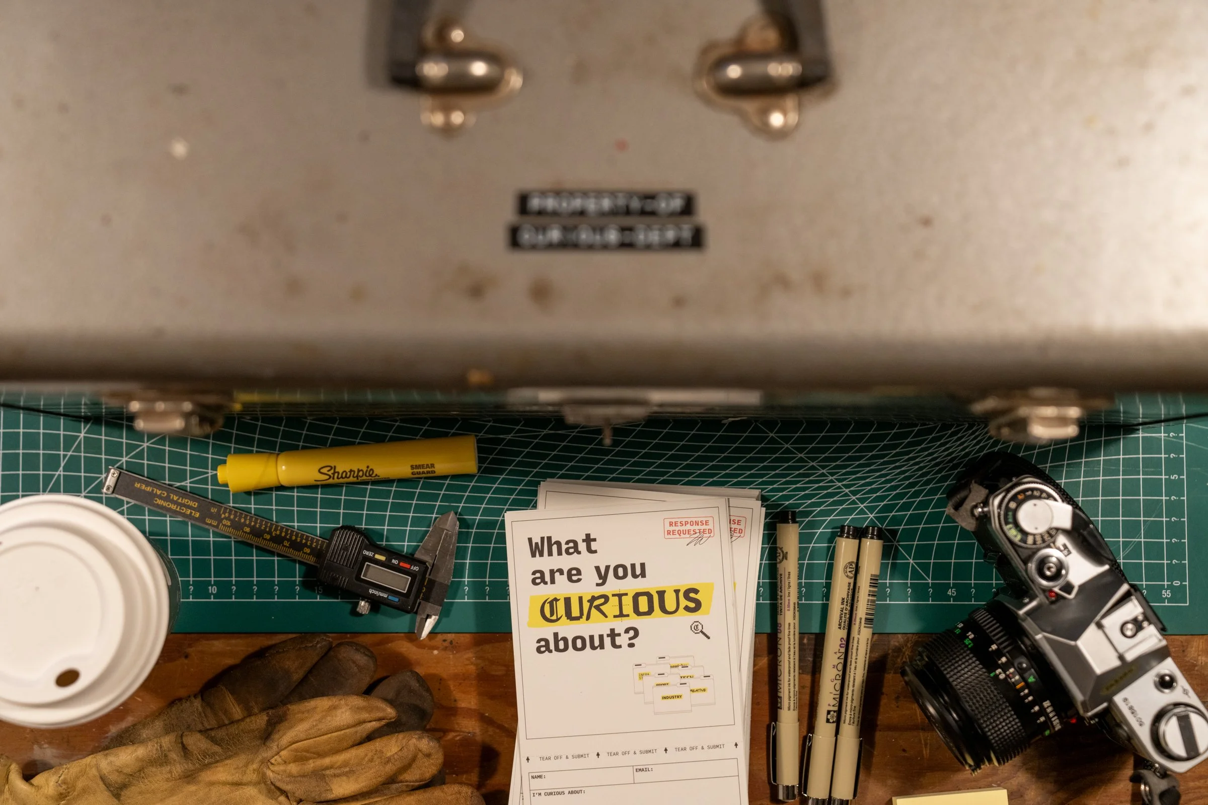 Worn toolbox with items around it