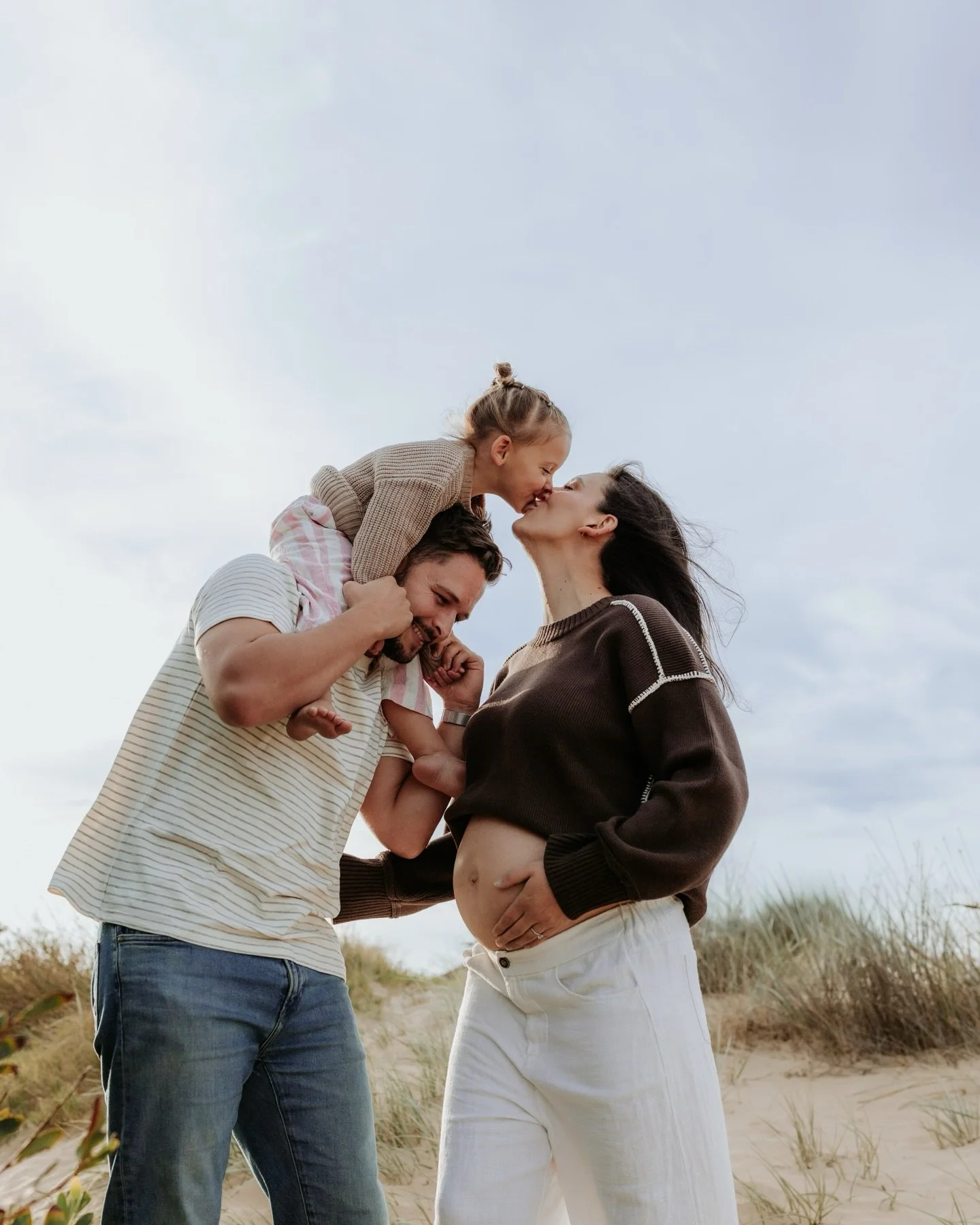 Capturing forever memories for this beautiful family before they become a family of four. 
Sand between toes, belly kisses, and tickles all around. 🤰🏼🐚

As the seasons begin to change and the air cools, do not let that stop us from stepping outdoo