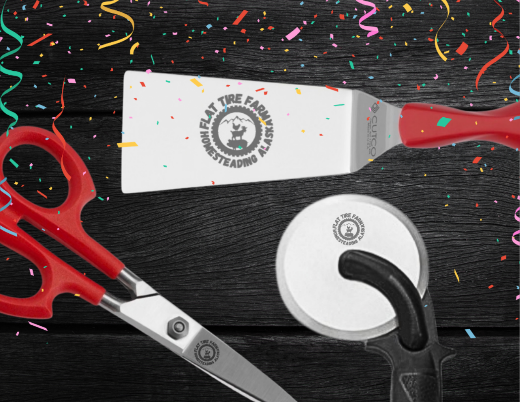 Three Cutco Prizes Engraved with Flat Tire Farm Logo: Scissors, Spatula, and Pizza Cutter