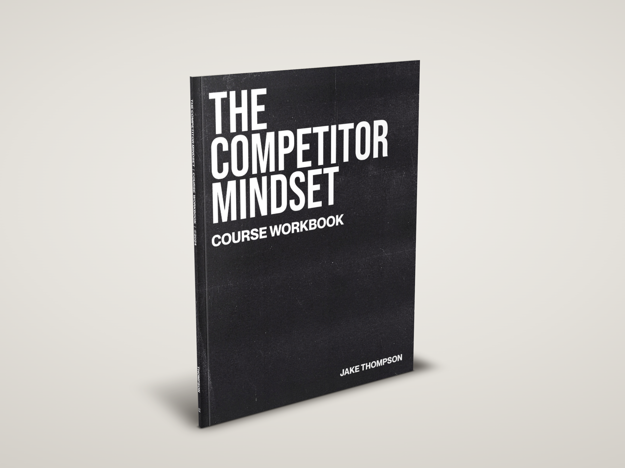 A black course workbook titled "The Competitor Mindset" by Jake Thompson, standing upright against a plain light-colored background.