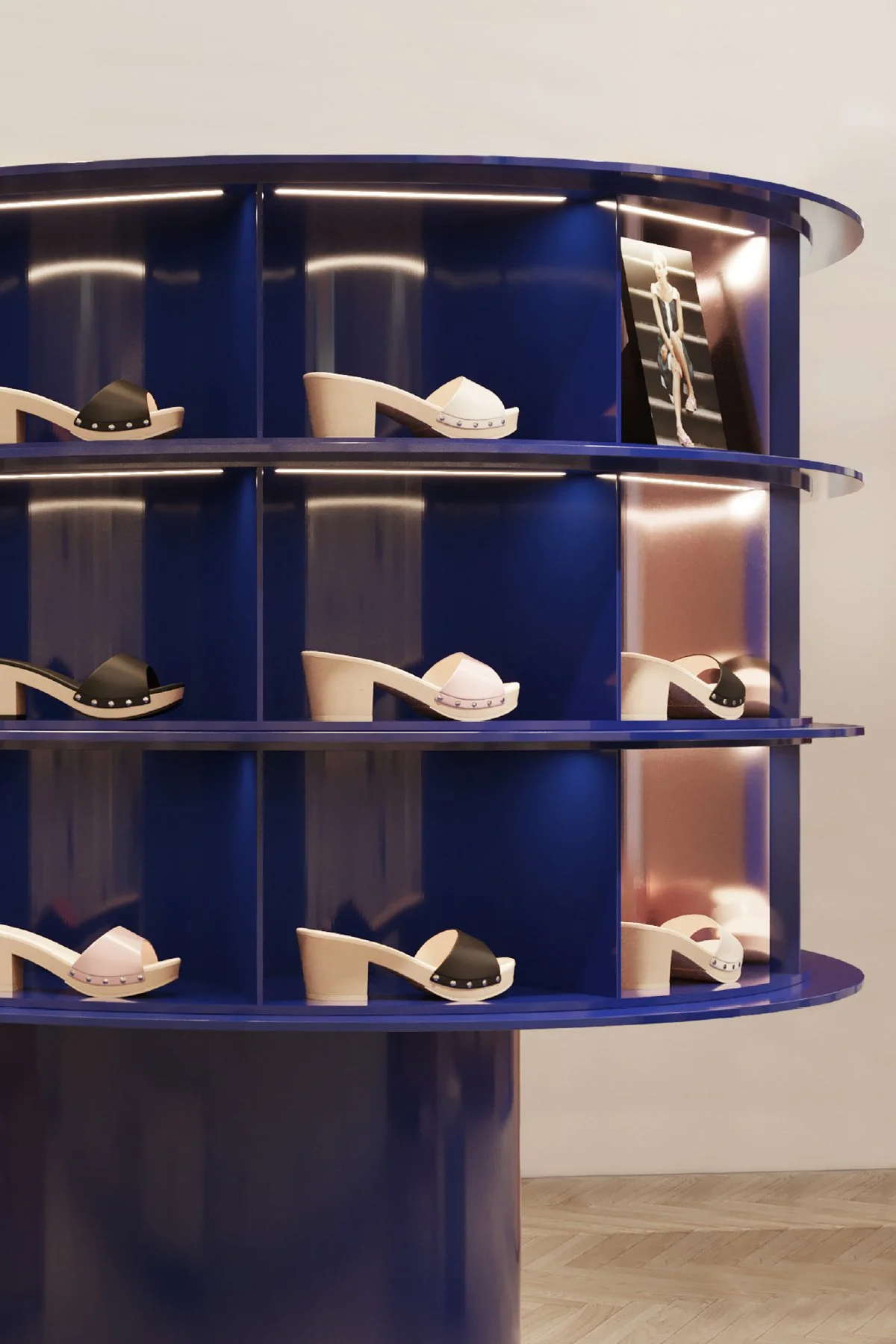 Blue cylinder shoe display units, Scholl store, Milano