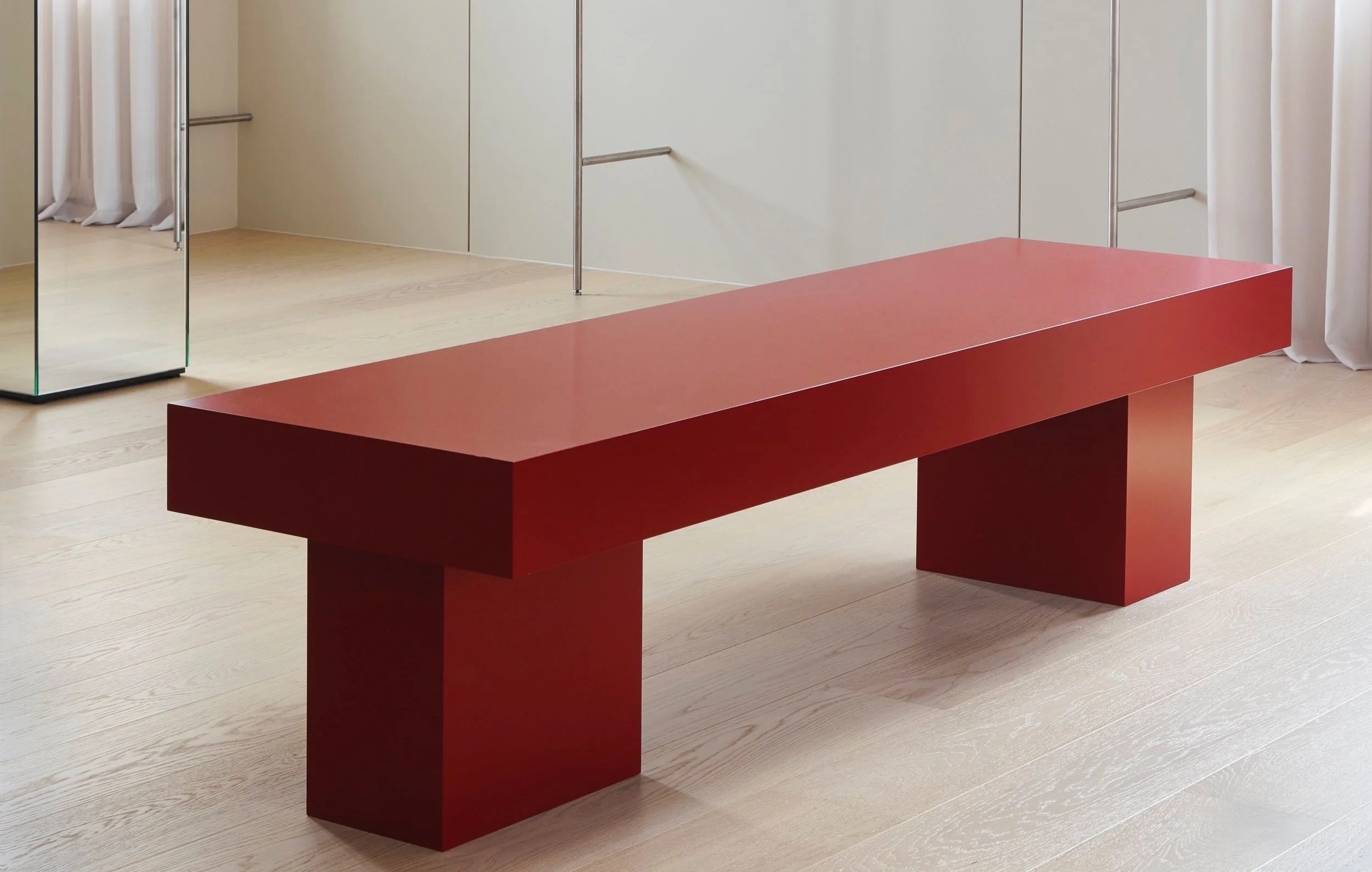 Chunky red lacquered display table, Dea Kudibal store fixture