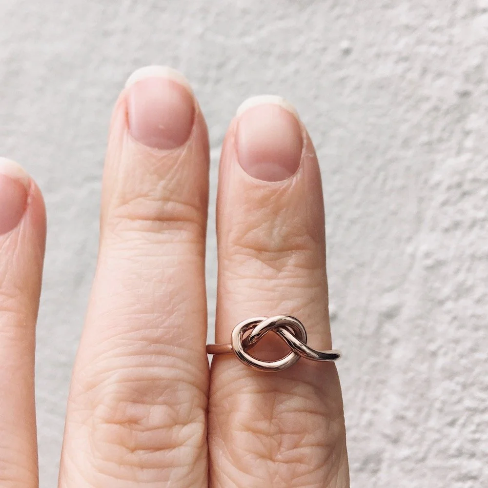 handmade bespoke love knot commitment ring by lucy thompson