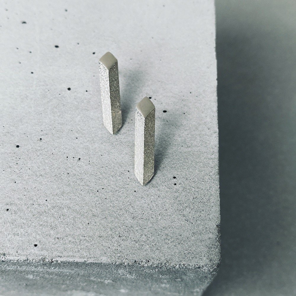distinct-silver-angle-bar-stick-studs.jpg