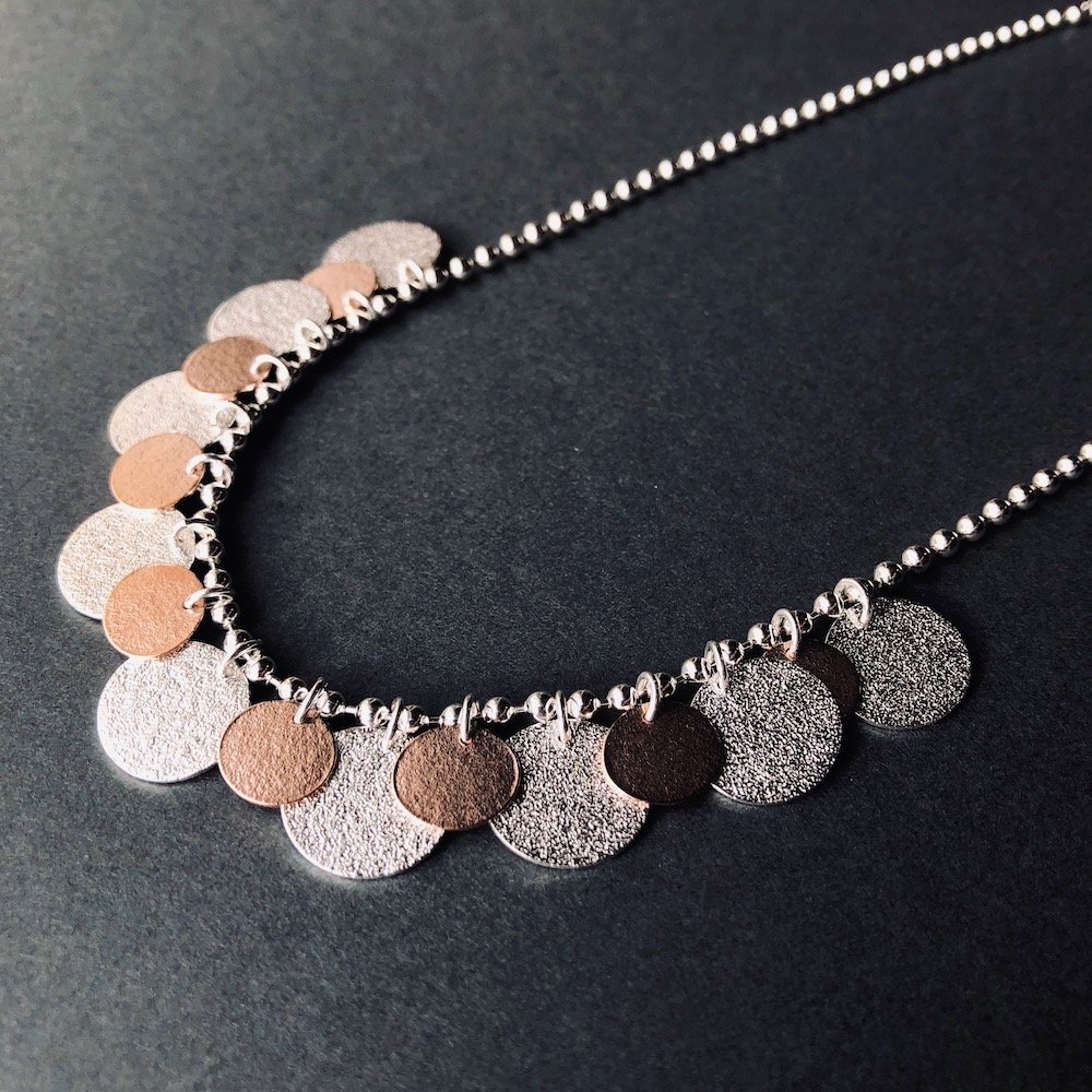 textured-silver-disc-necklace.jpeg
