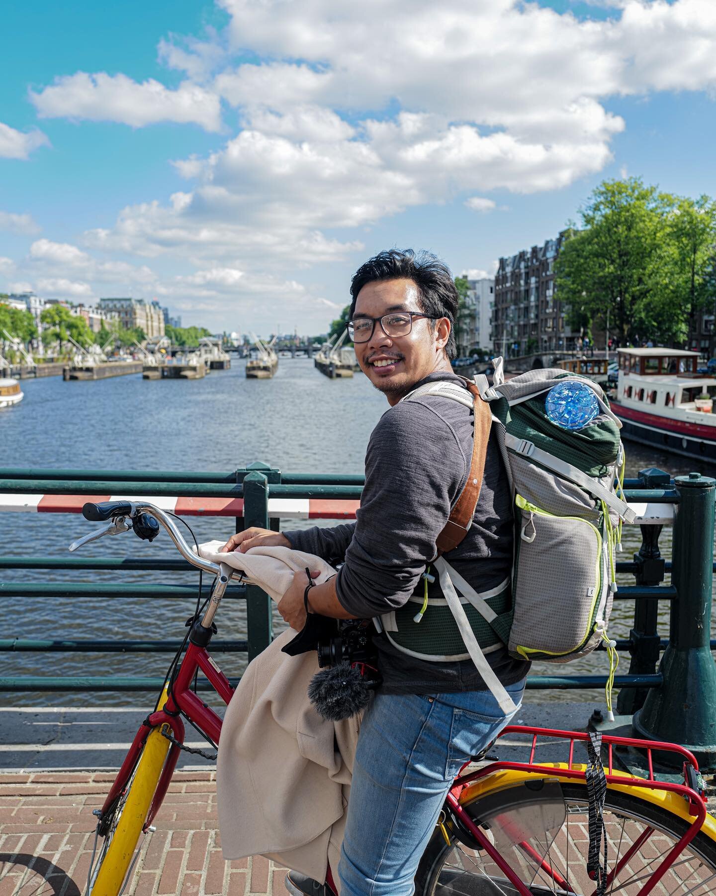 In another life, we&rsquo;d be cycling through the streets of Amsterdam, relying on our bikes like we do with our cars. 

Ever think about how different your life would be if you had lived in another city? ☁️

.
.
.
.
.

#netherlands #amsterdam #holl