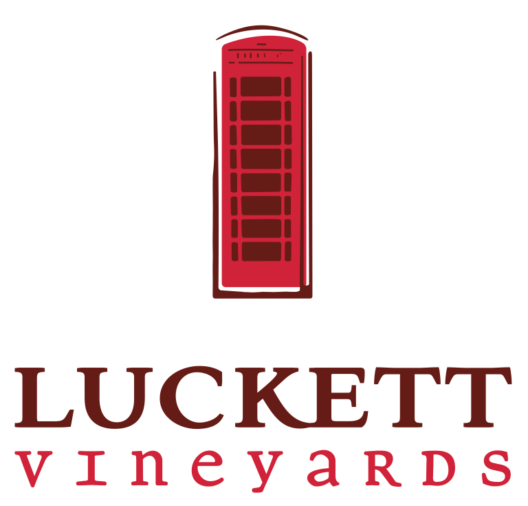 Logo of Luckett Vineyards featuring a red telephone booth design.