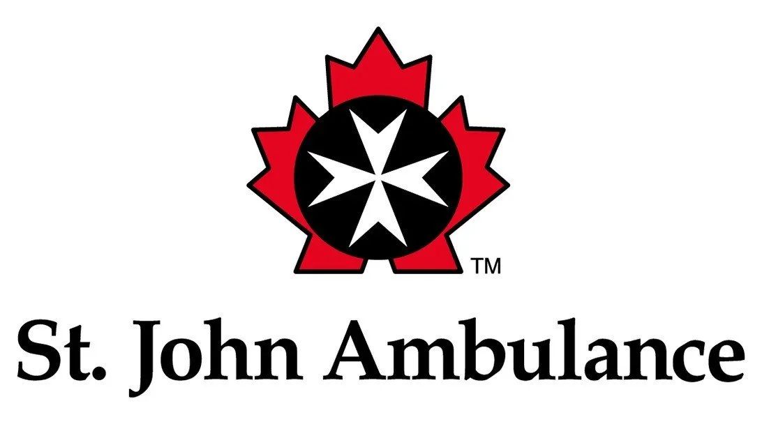 St. John Ambulance logo featuring a red maple leaf with a black and white eight-pointed Maltese cross in the center, and the text "St. John Ambulance" underneath.