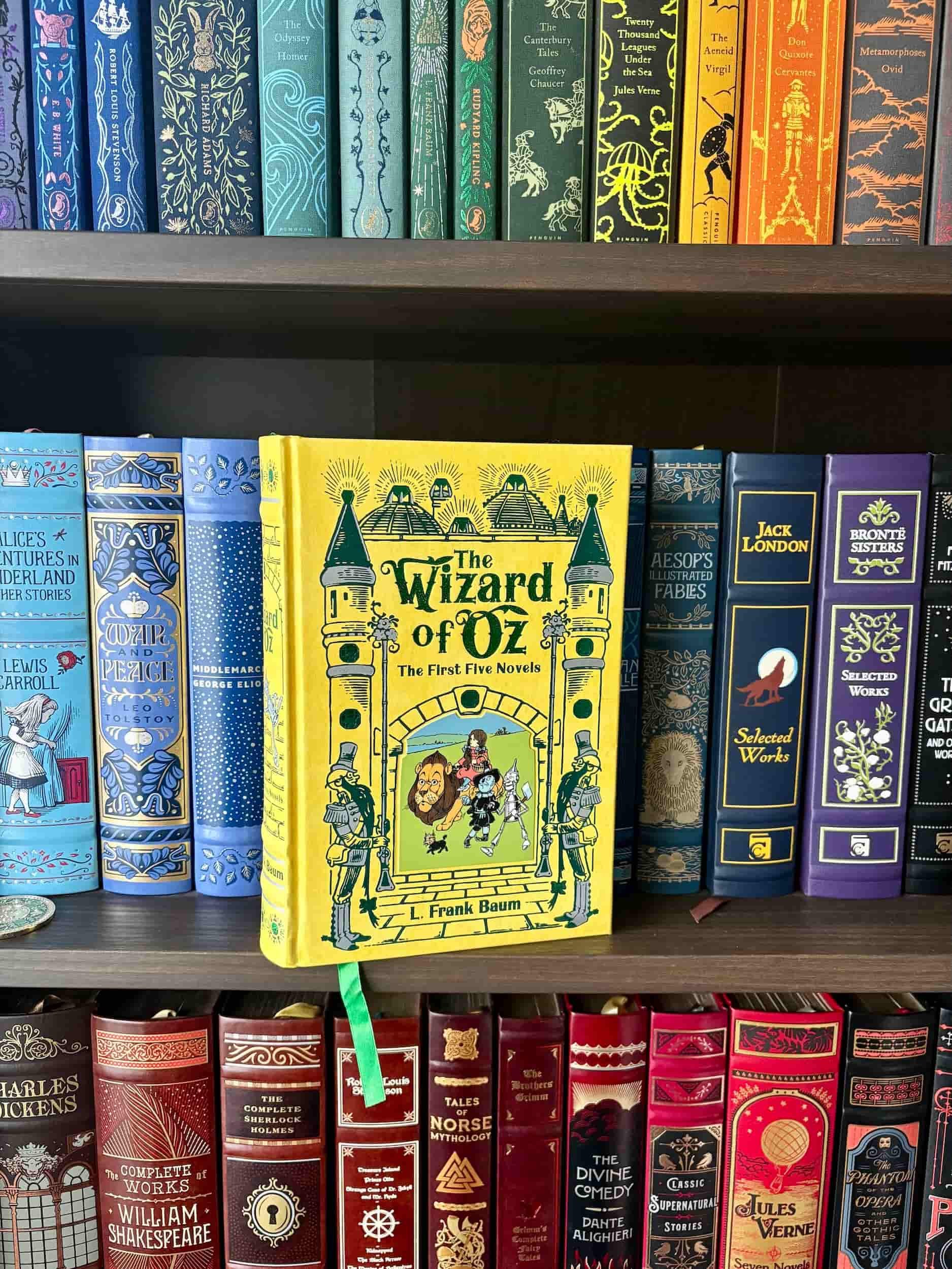 Leatherbound edition of The Wonderful Wizard of Oz children's book with colorful cover art.