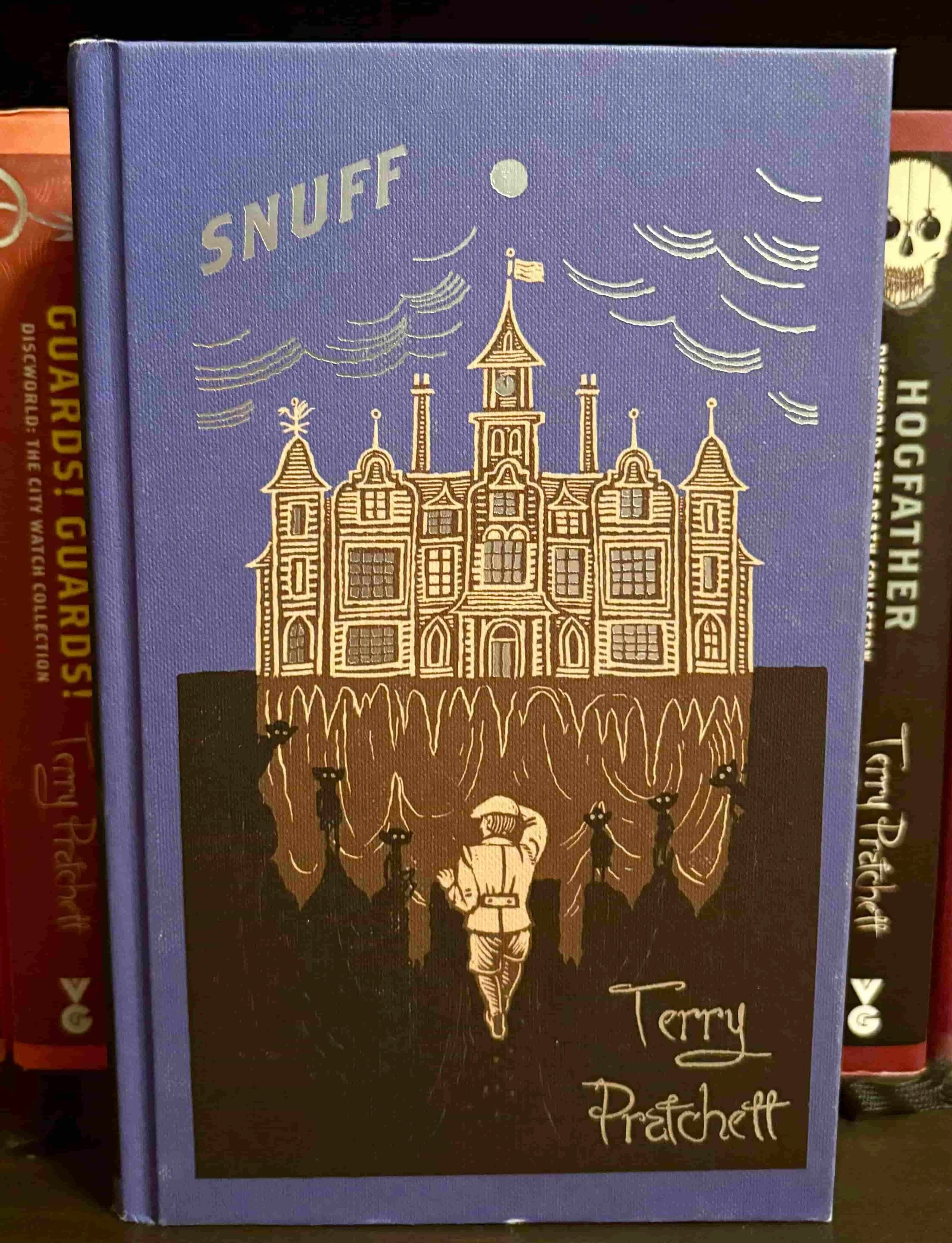 The dark blue cover of Snuff by Terry Pratchett, featuring a goblin silhouette.