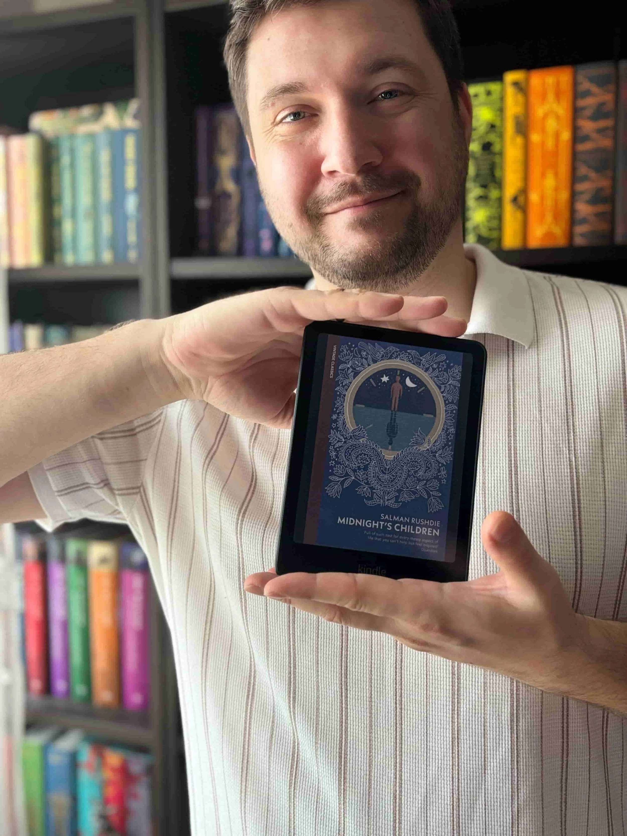 Midnight's Children by Salman Rushdie held by Aleksandar Nikolov of His and Hers Book Club - 10 best Indian Novels for Beginners 2026