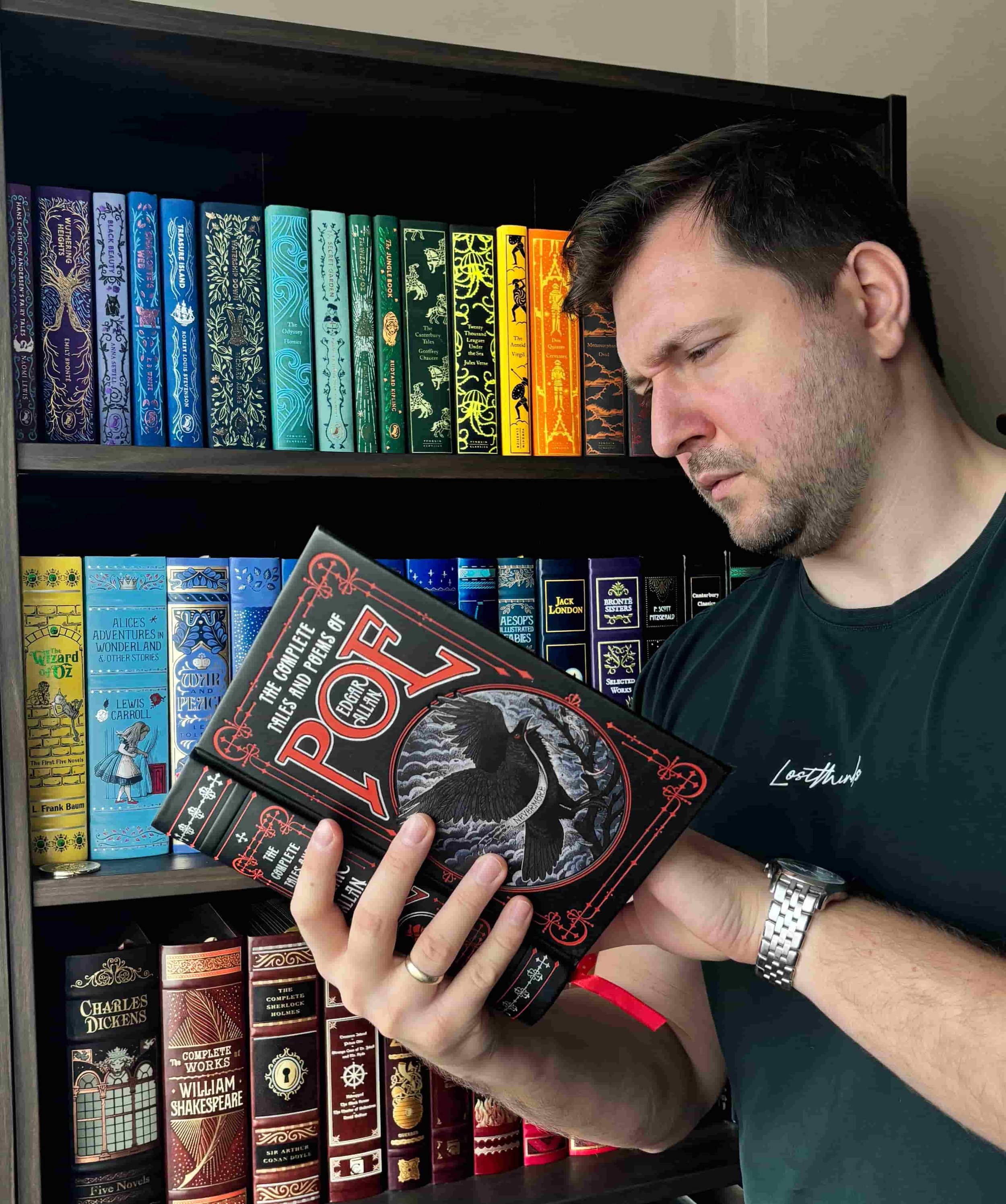 Alex Nikolov of His and Hers Book Club holding the leatherbound edition of The Complete Tales and Poems of Edgar Allan Poe 2026