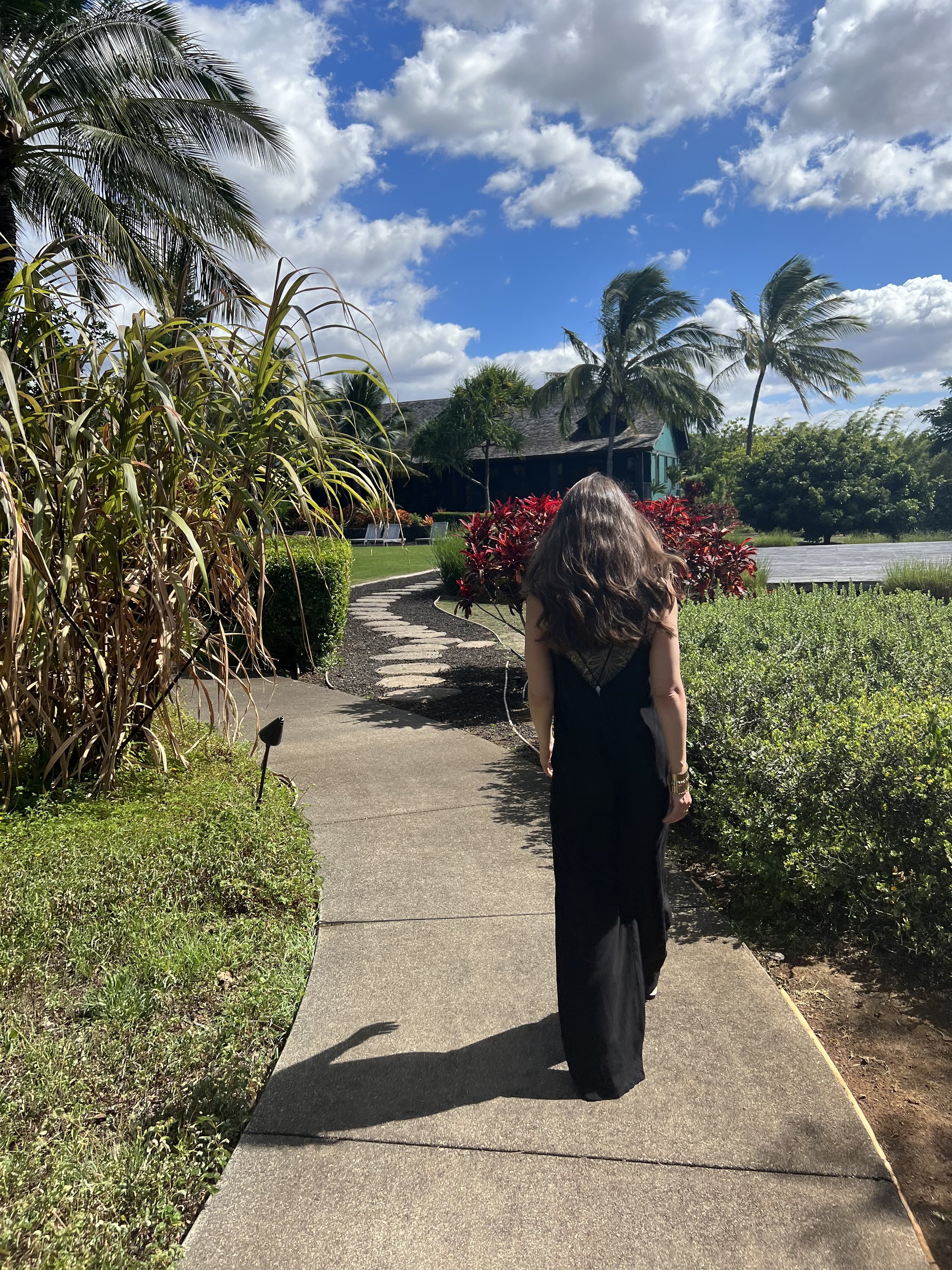 Woman stepping forward, symbolizing personal rebirth and feminine empowerment.