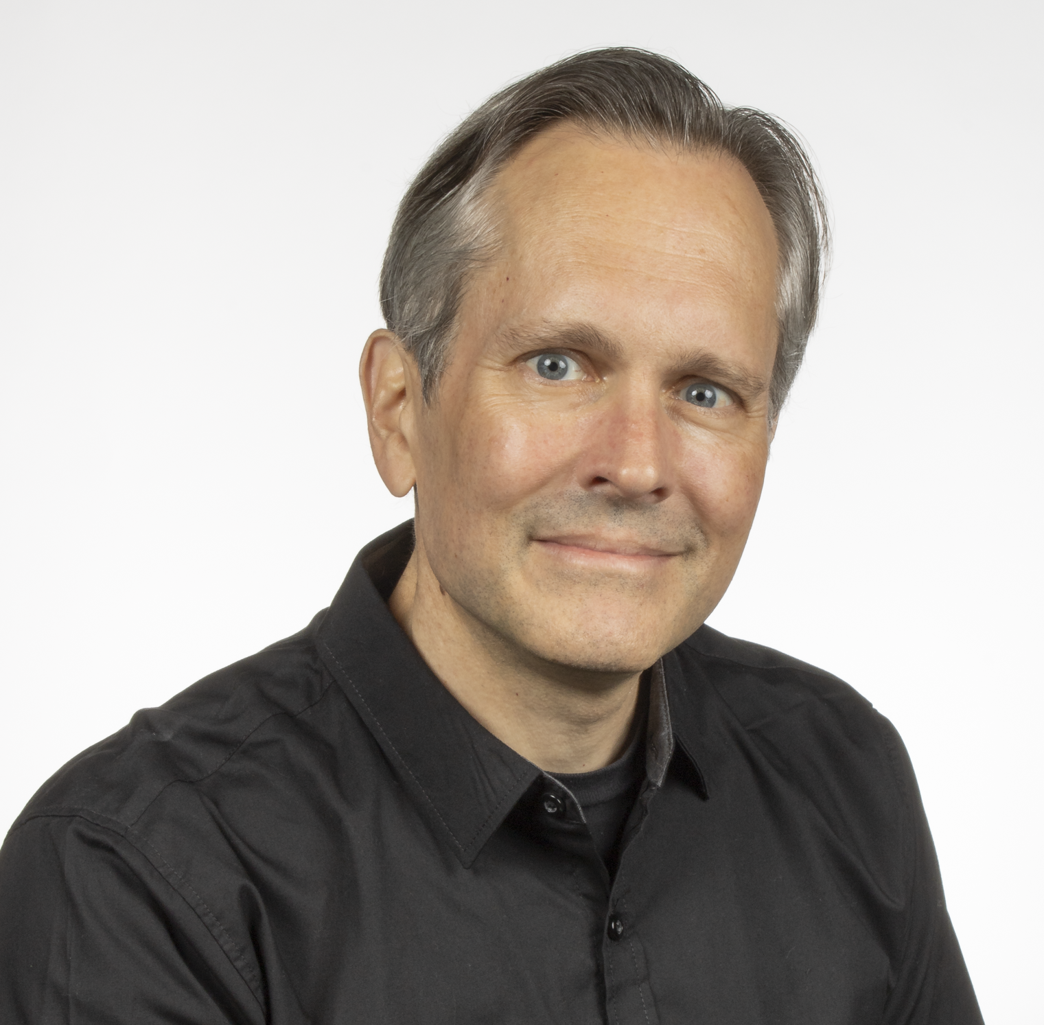 Headshot of A4 foudner Phil Neal