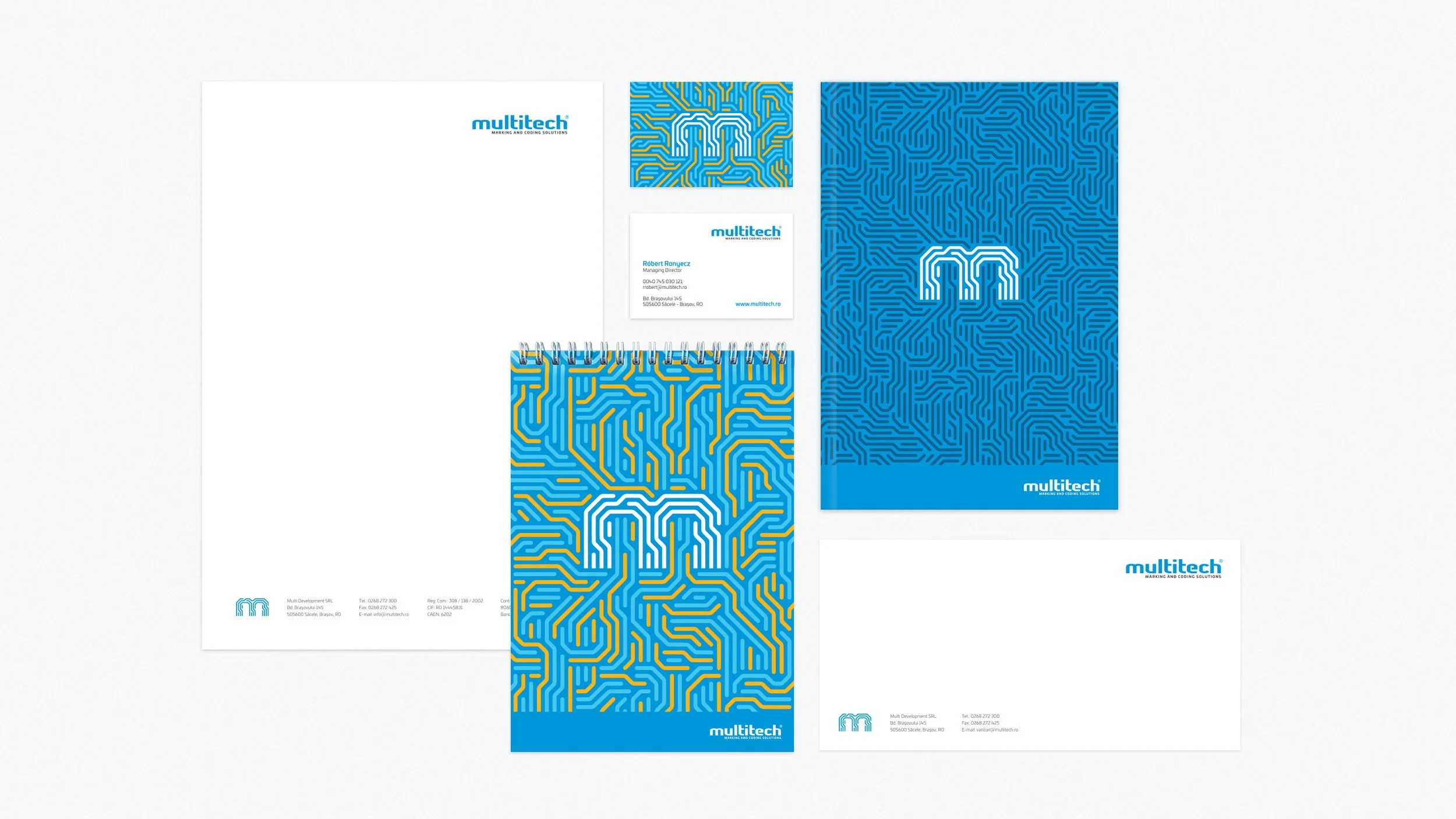 Multitech stationery and printed collateral featuring the blue and yellow geometric brand pattern and symbol.