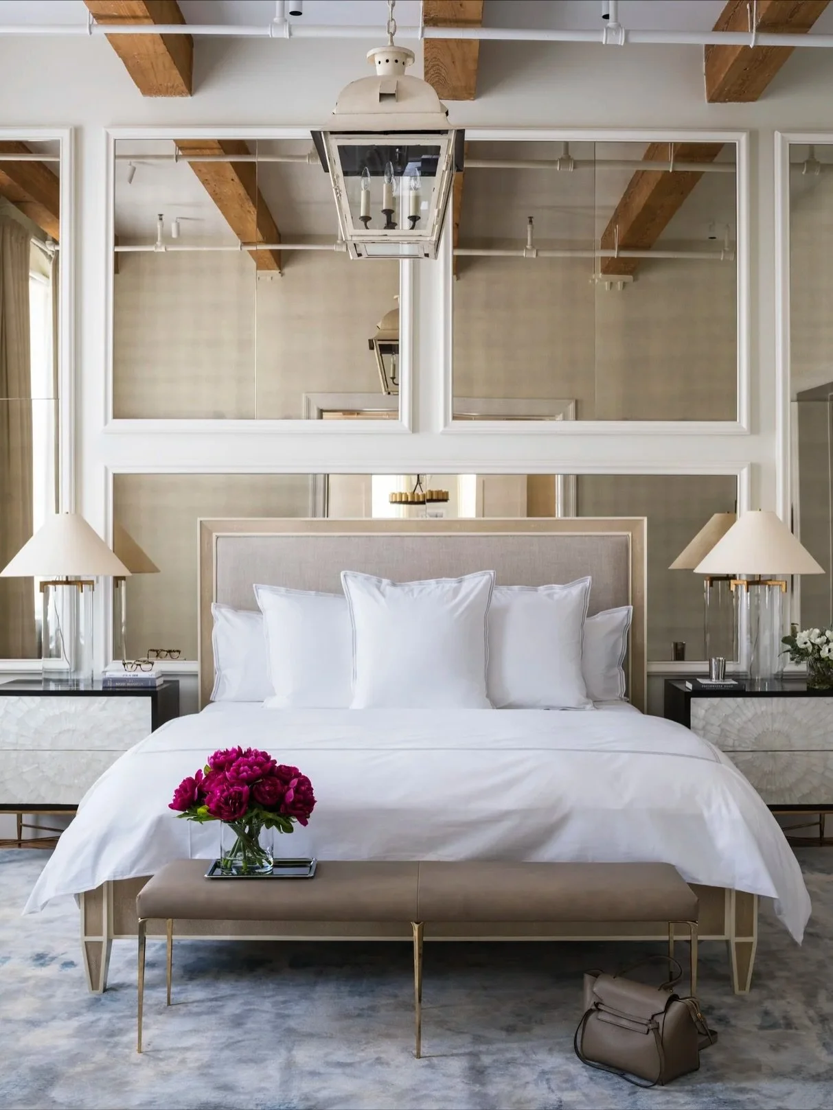 Elegant and understated, the primary and secondary bedrooms at our Williamsburg Loft project balance classic detailing with rustic ceiling beams and the raw character of an industrial loft. A quiet dialogue between tradition and grit.

Interior desig