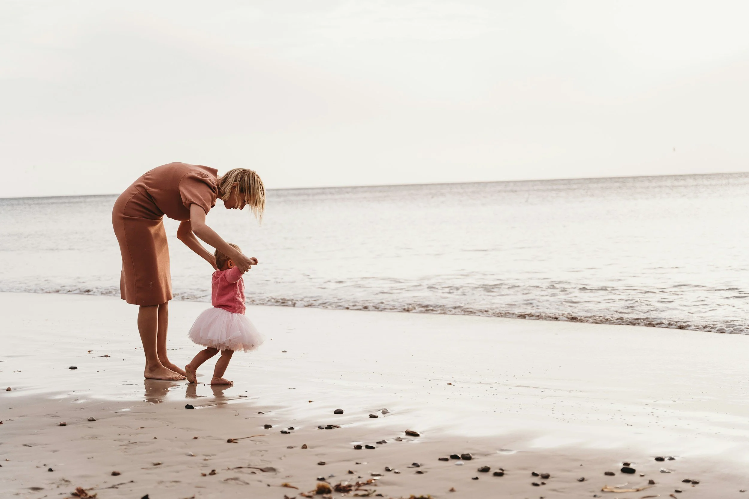 Child therapist helping a young child feel calm and safe during the first phase of reunification therapy