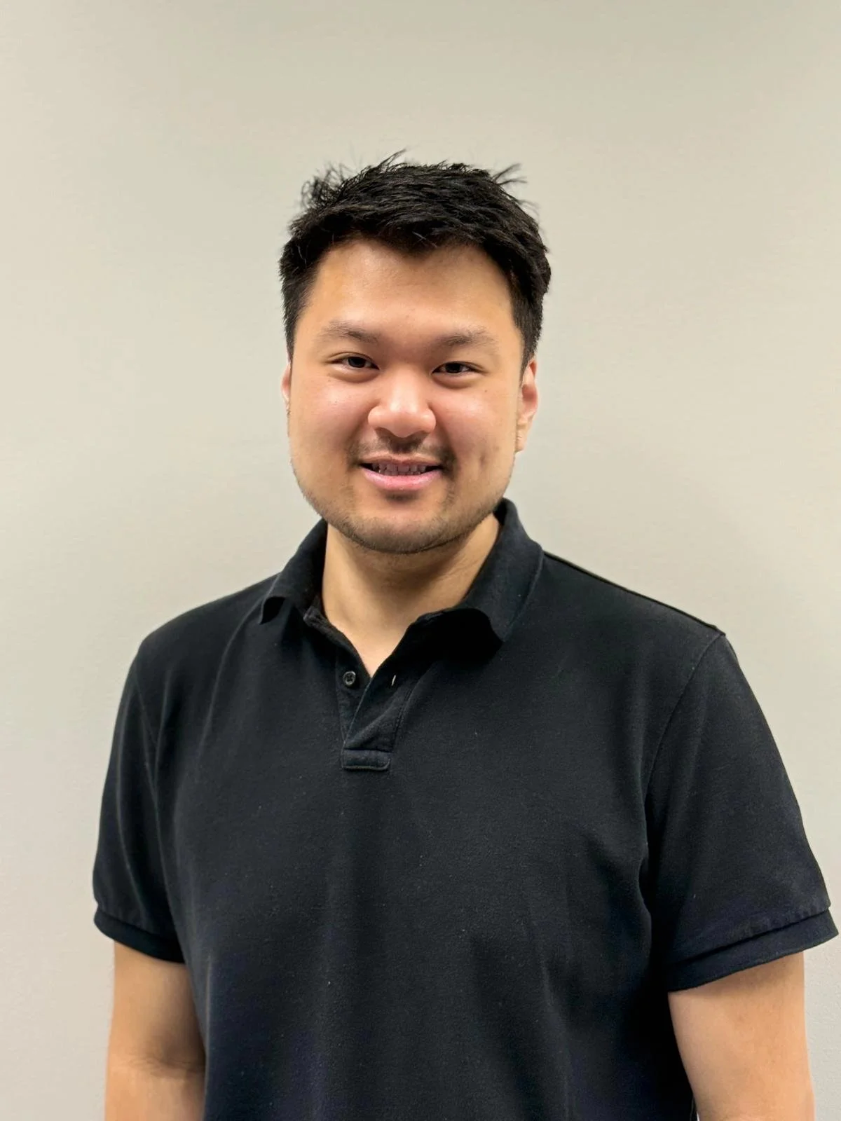 Portrait of lab member John Nguyen