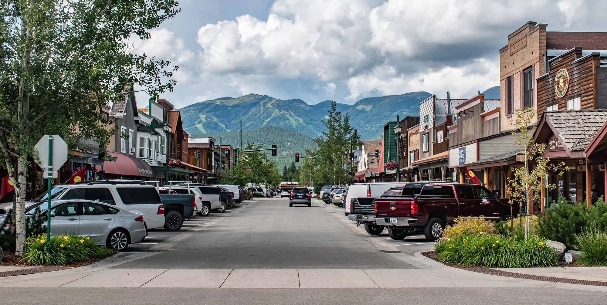 Central Avenue in Whitefish, Montana looking down the street to view Whitefish Mountain ski resort in the distance