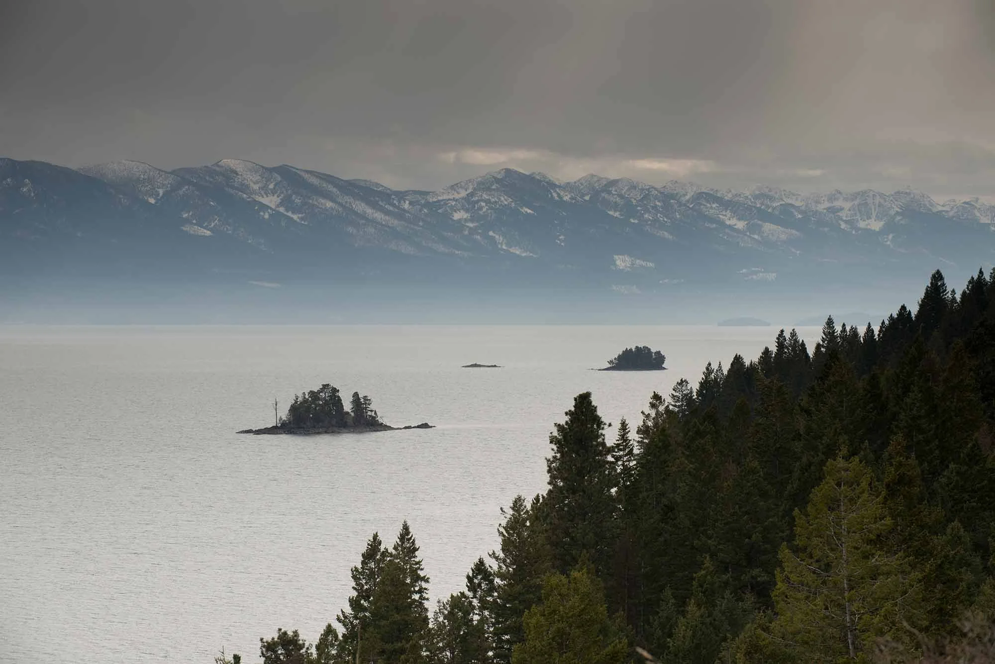 Panoramic view across Flathead Lake in Lakeside, Montana to the Mission Mountains beyond