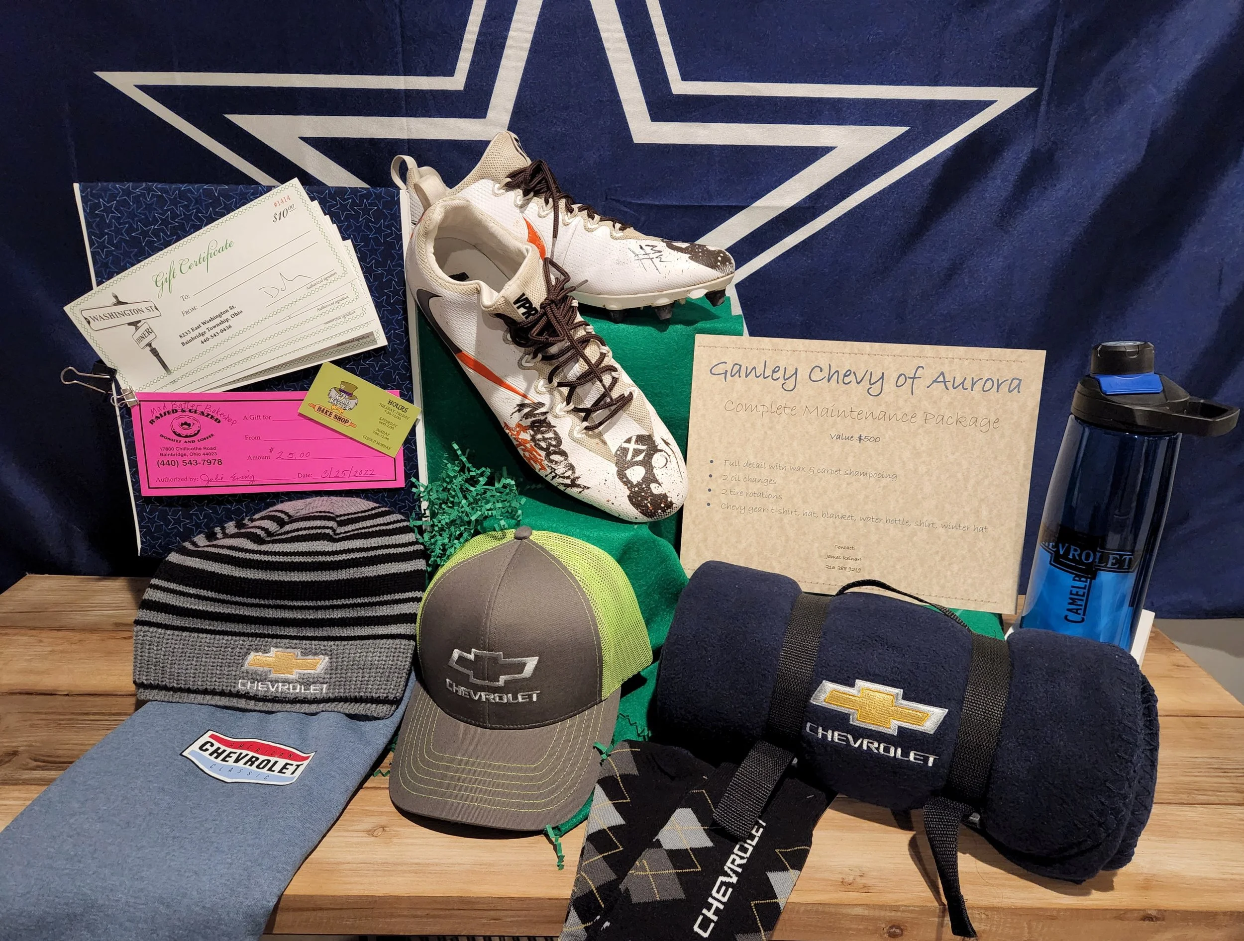 Prize Package 25 - 

Donated by:
Hannah Lee - Cleveland Browns Org.
James Reinart - Ganley Chevy of Aurora
Washington Street Diner
Mad Batter