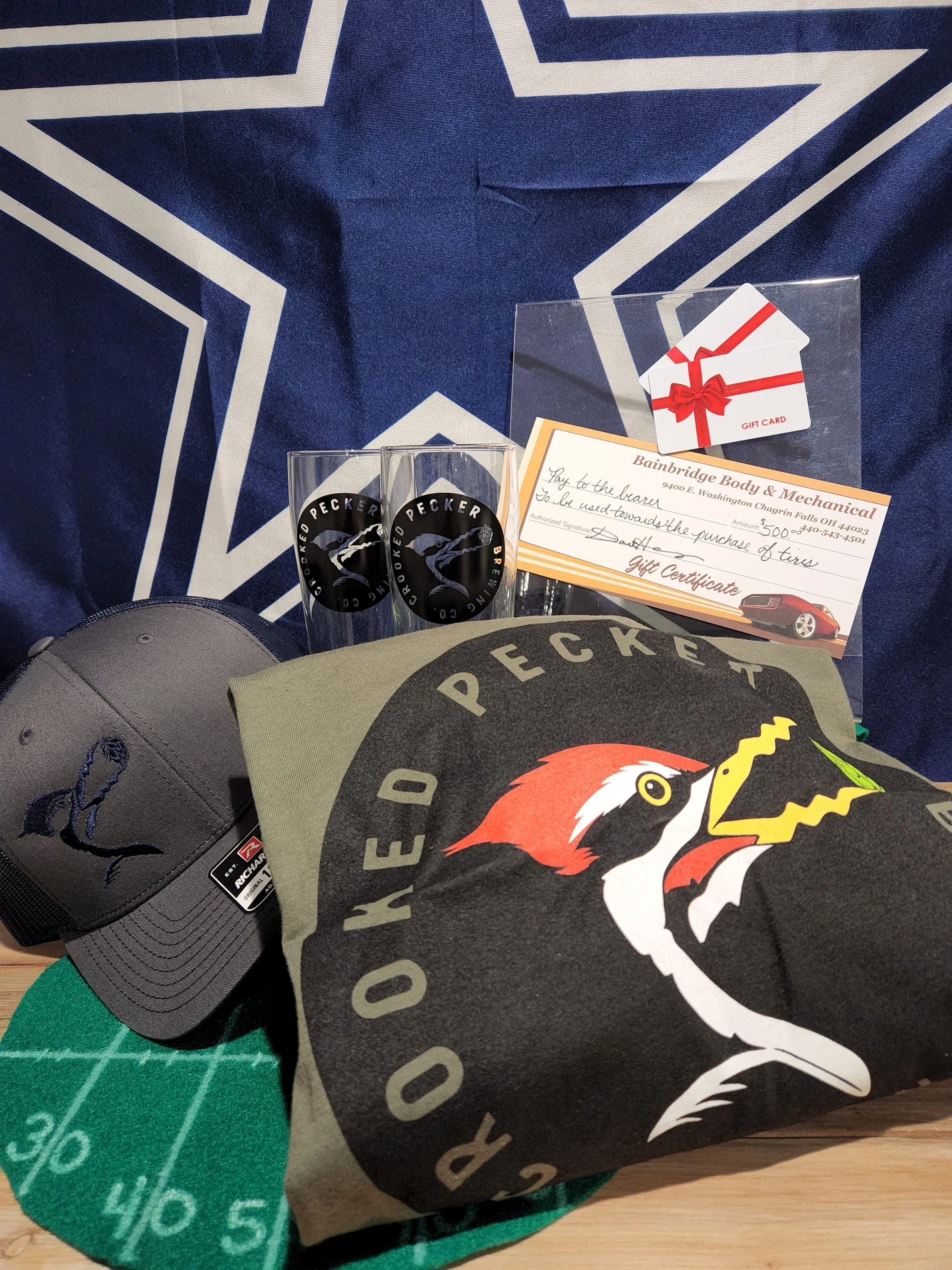 Prize Package 35 - 

Donated by: 
Bainbridge Autobody
Crooked Pecker Brewery
Auburn Inn