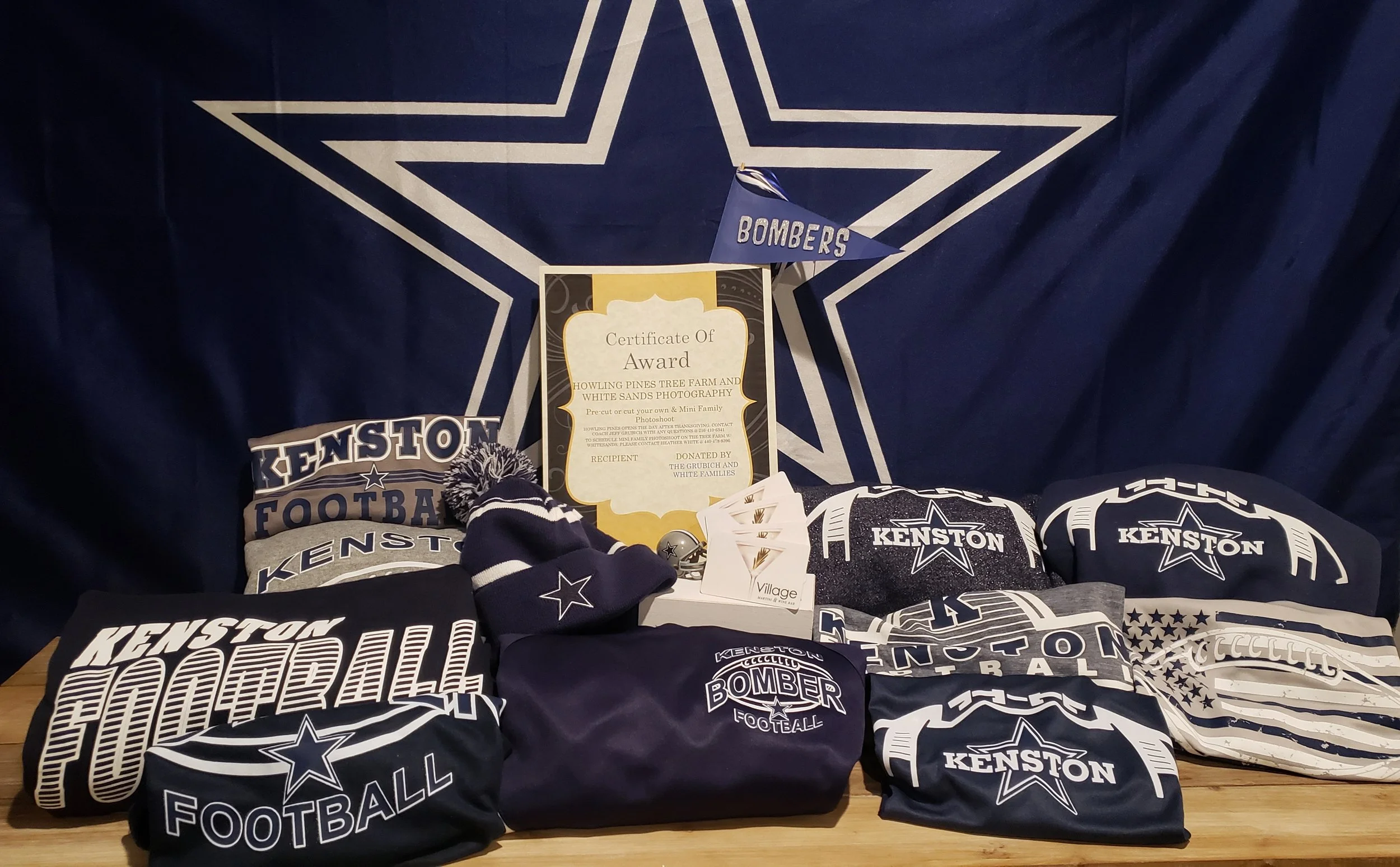 Prize Package 10 -  

Donated by:
8th Grade & Freshman Football Families
Howling Pines Tree Farm,
WhiteSands Photography,
2Belles,
Village Martini & Wine Bar