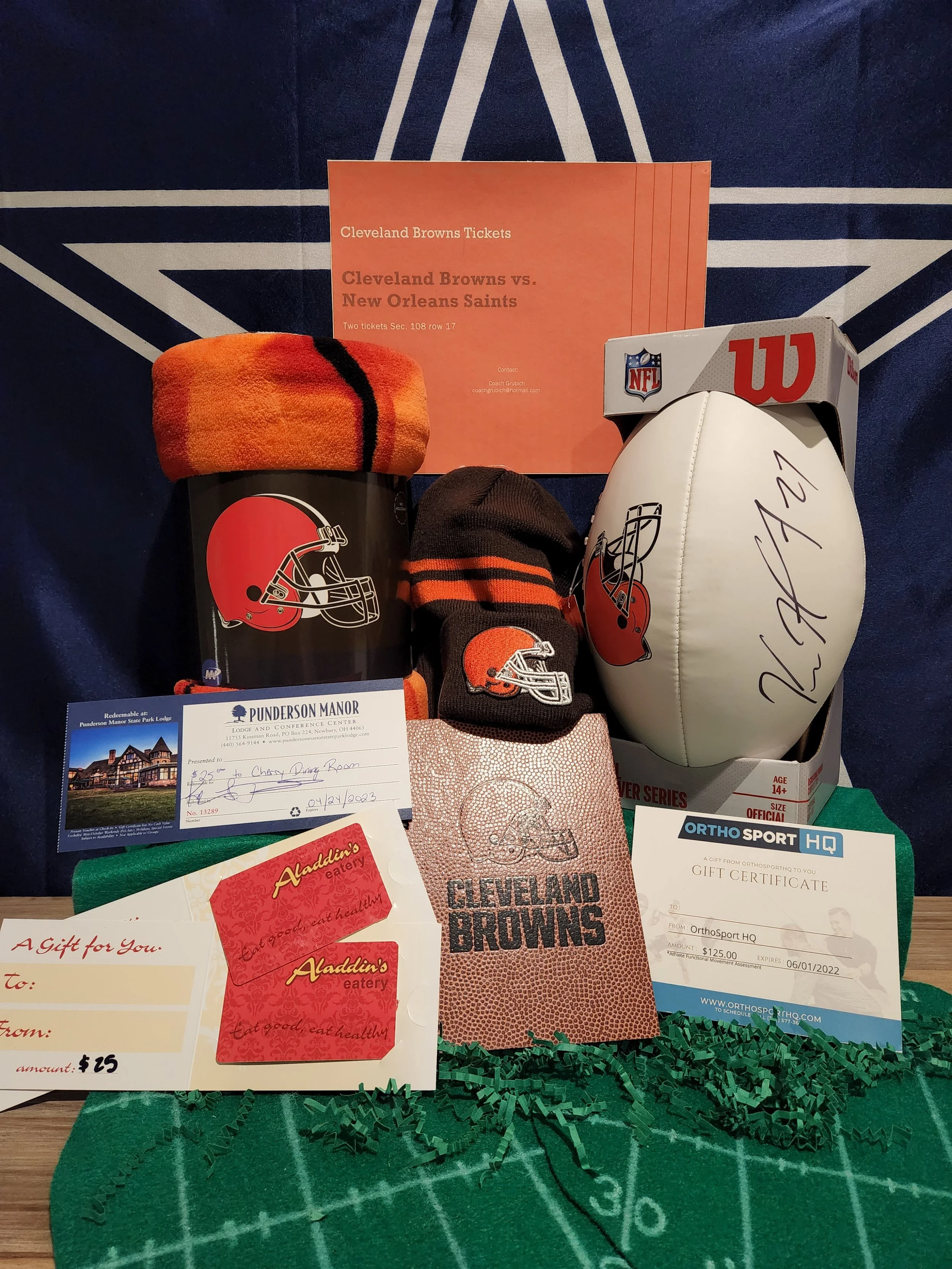 Prize Package 31 - 

Donated by:
The Abbarno Family
Hannah Lee - Cleveland Browns Org.
Dr. James Yoder
Aladdin's Eatery
Punderson Manor