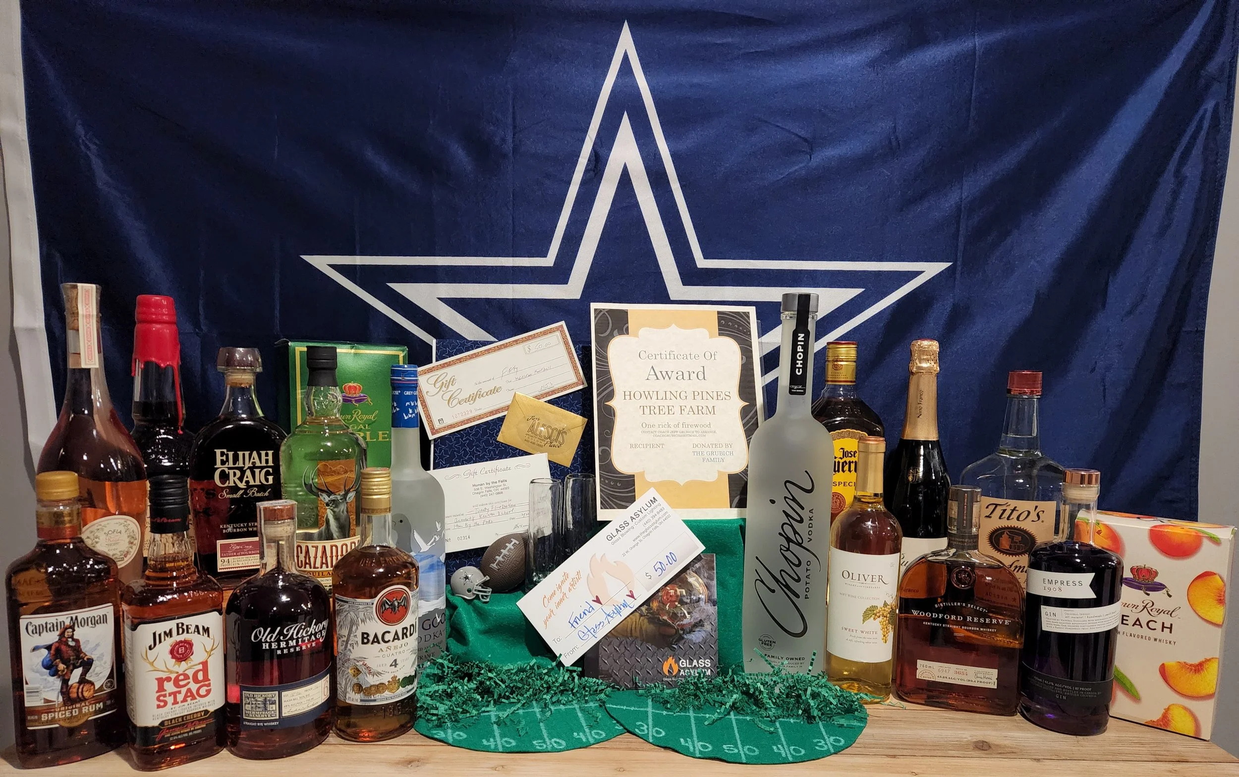 Prize Package 22 - 

Donated by:
Junior & Sophomore Football Families,
Howling Pines Tree Farm,
Glass Assylum,
PR Cigars,
Hunan by the Falls,
Alesci's