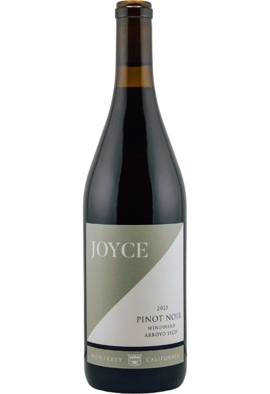 A wine bottle with a grey and white diagonal design, displaying the name 'Joyce' and a logo with the text 'Windward Arroyo Seco'.