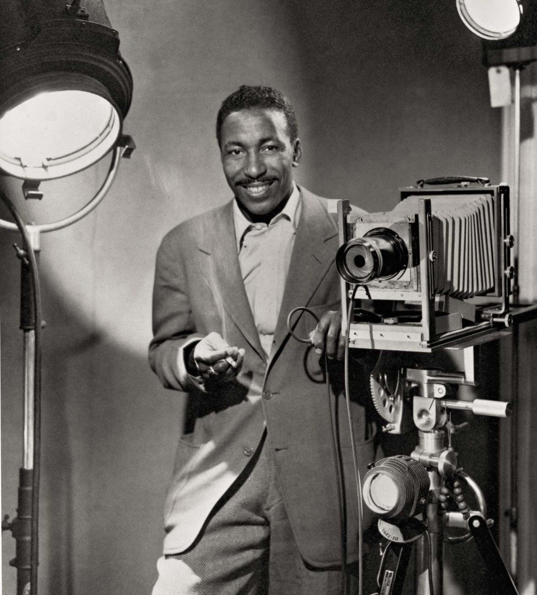   Gordon Parks, Sr. posing with camera , 1945. Photograph by Morgan Smith (1910–1993) and Marvin Smith (1910–2003) 