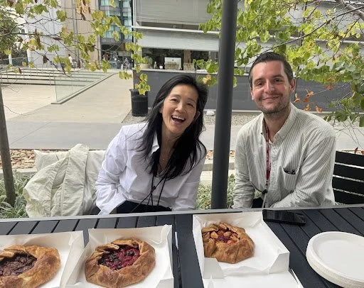Two people smiling for the camera