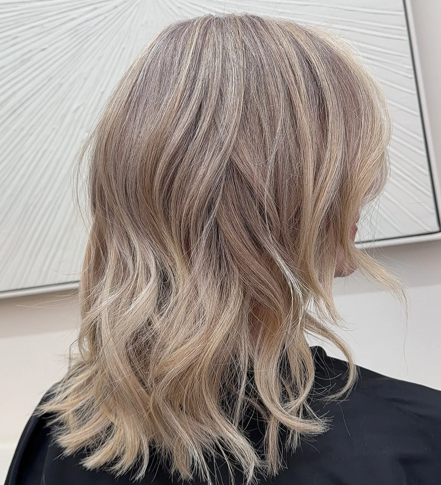 &ldquo;Who says grey hair can&rsquo;t look gorgeous? 👏
With a mix of highlights and lowlights, we&rsquo;ve created soft dimension and beautifully blended the greys for a natural, low-maintenance finish.
This look will grow out gracefully &mdash; las