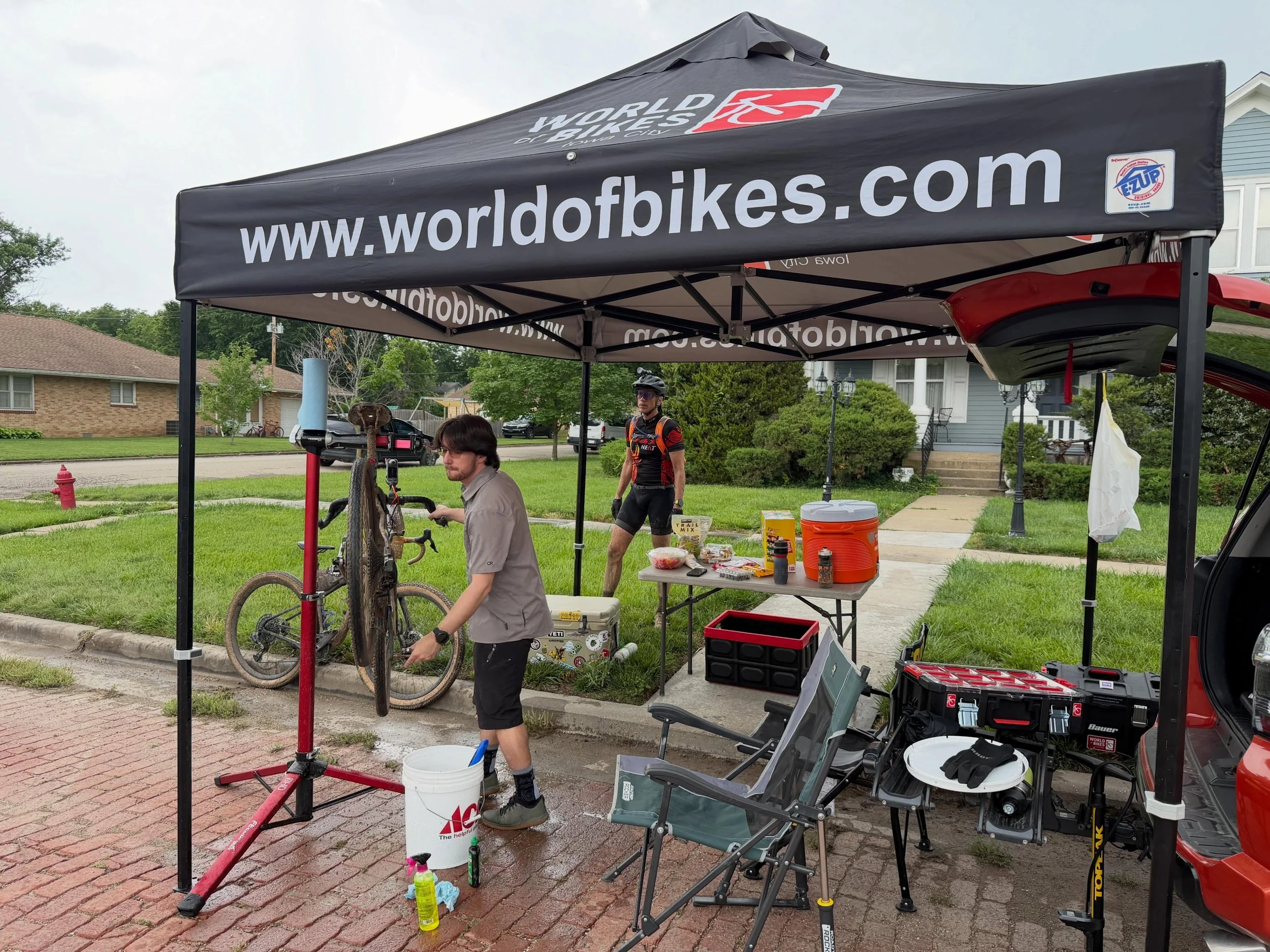 WoB crew running support for @sprengerk and @djsactive at @unboundgravel. All smiles (muddy ones) at Checkpoint 1.